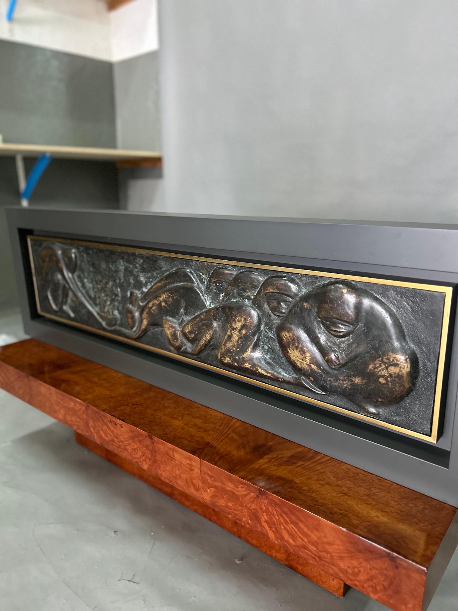 Mid-century modern large green patinated brass wall plaque with dark green lacquered and gilded frame.
The mesures shown are including the frame.