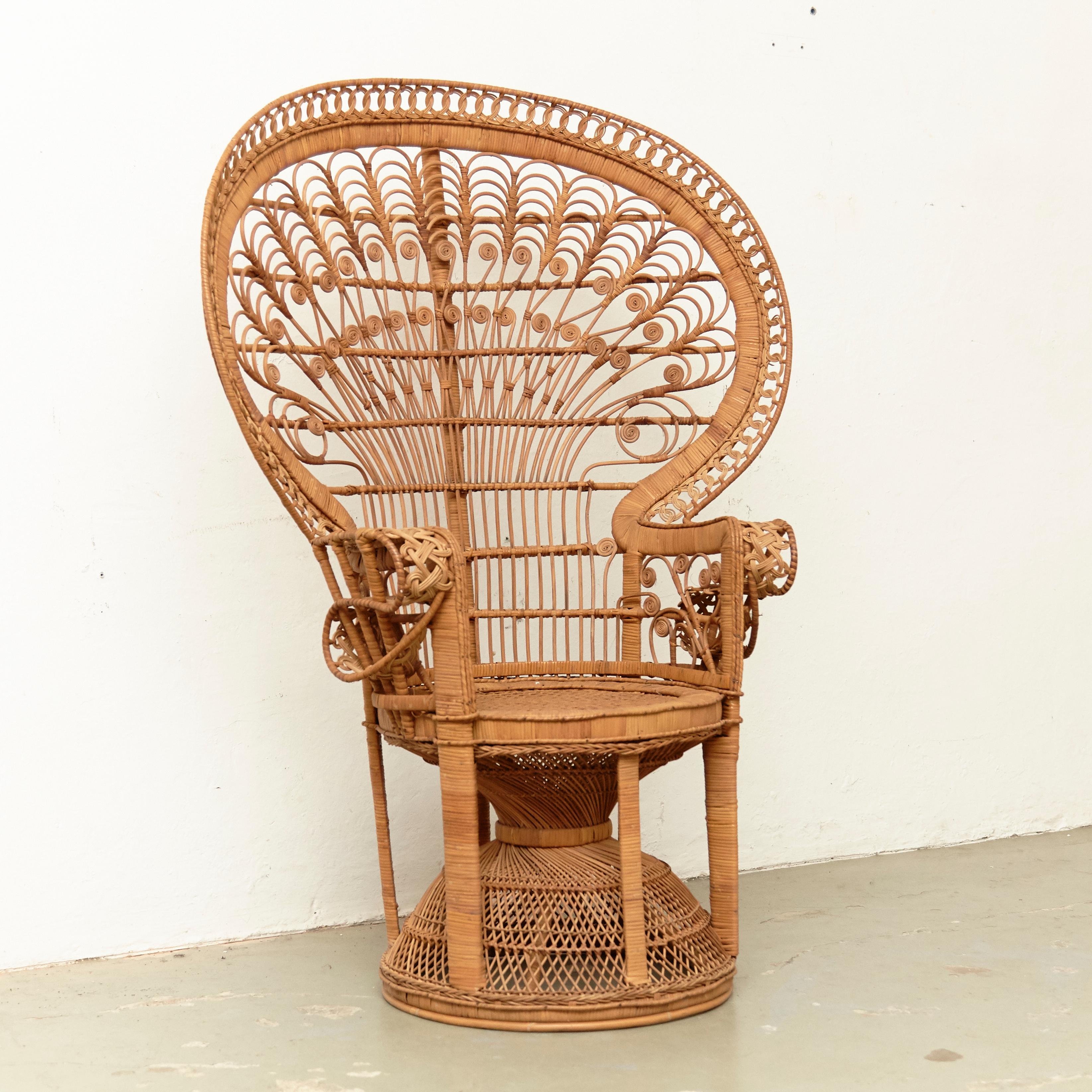Mid-Century Modern Emmanuelle armchair rattan, circa 1960
Traditionally manufactured in France.

By unknown designer.

In original condition with minor wear consistent of age and use, preserving a beautiful patina.

 