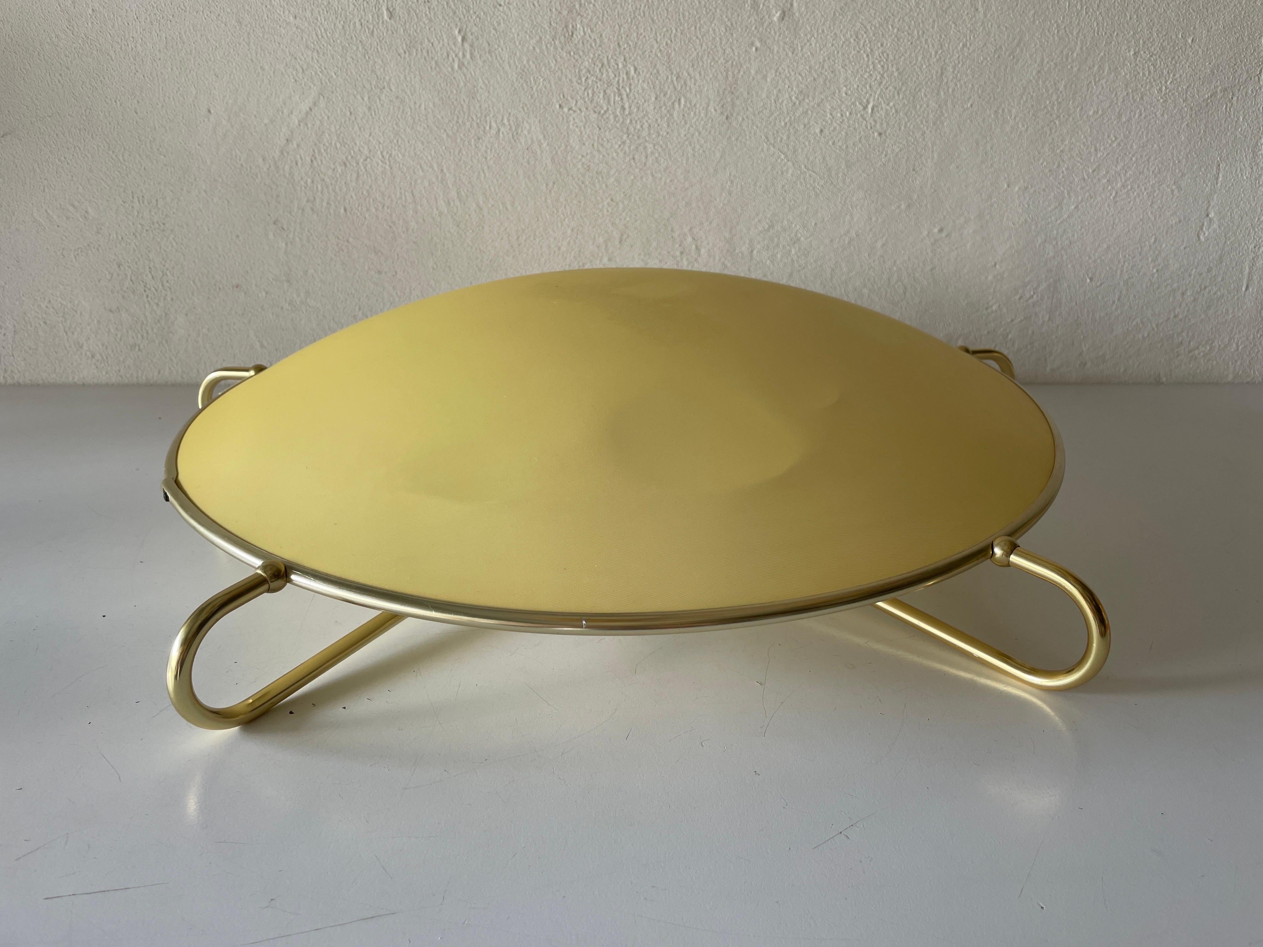 Mid-Century Modern large flush mount ceiling or wall lamp by Erco, 1950s Germany

Lampshade is in very good vintage condition.

This lamp works with 3x E27 light bulbs. 
Wired and suitable to use with 220V and 110V for all
