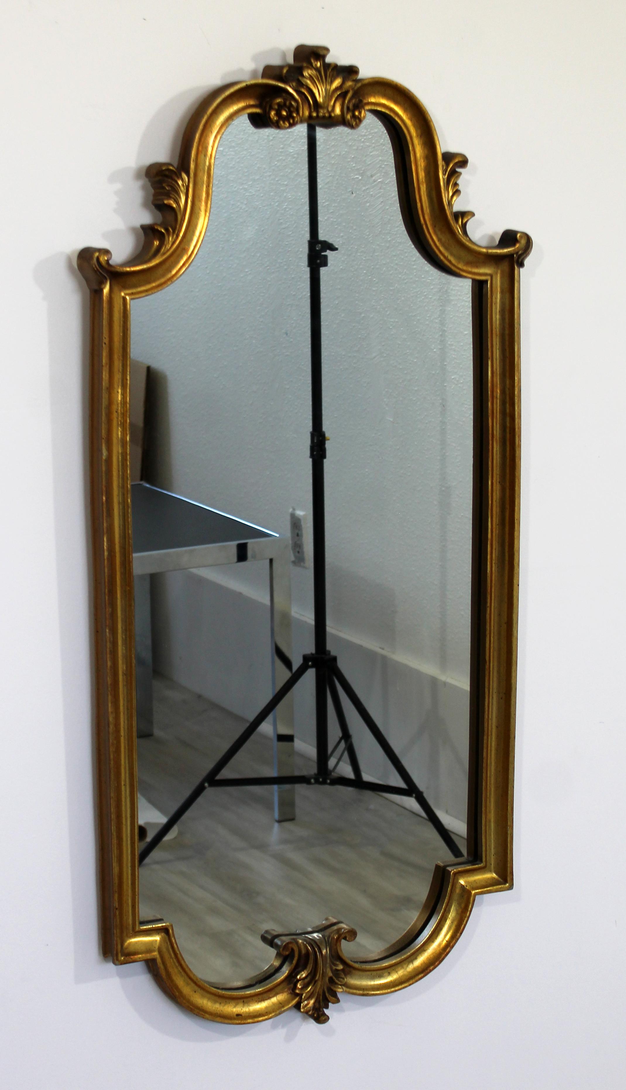 For your consideration is a glamorous, gold giltwood wall mirror, possibly by La Barge, circa 1960s. In very good vintage condition. The dimensions are 19.5