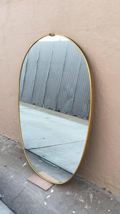 Mid-Century Modern Large Italian Mirror in Oval Shape with Brass Frame