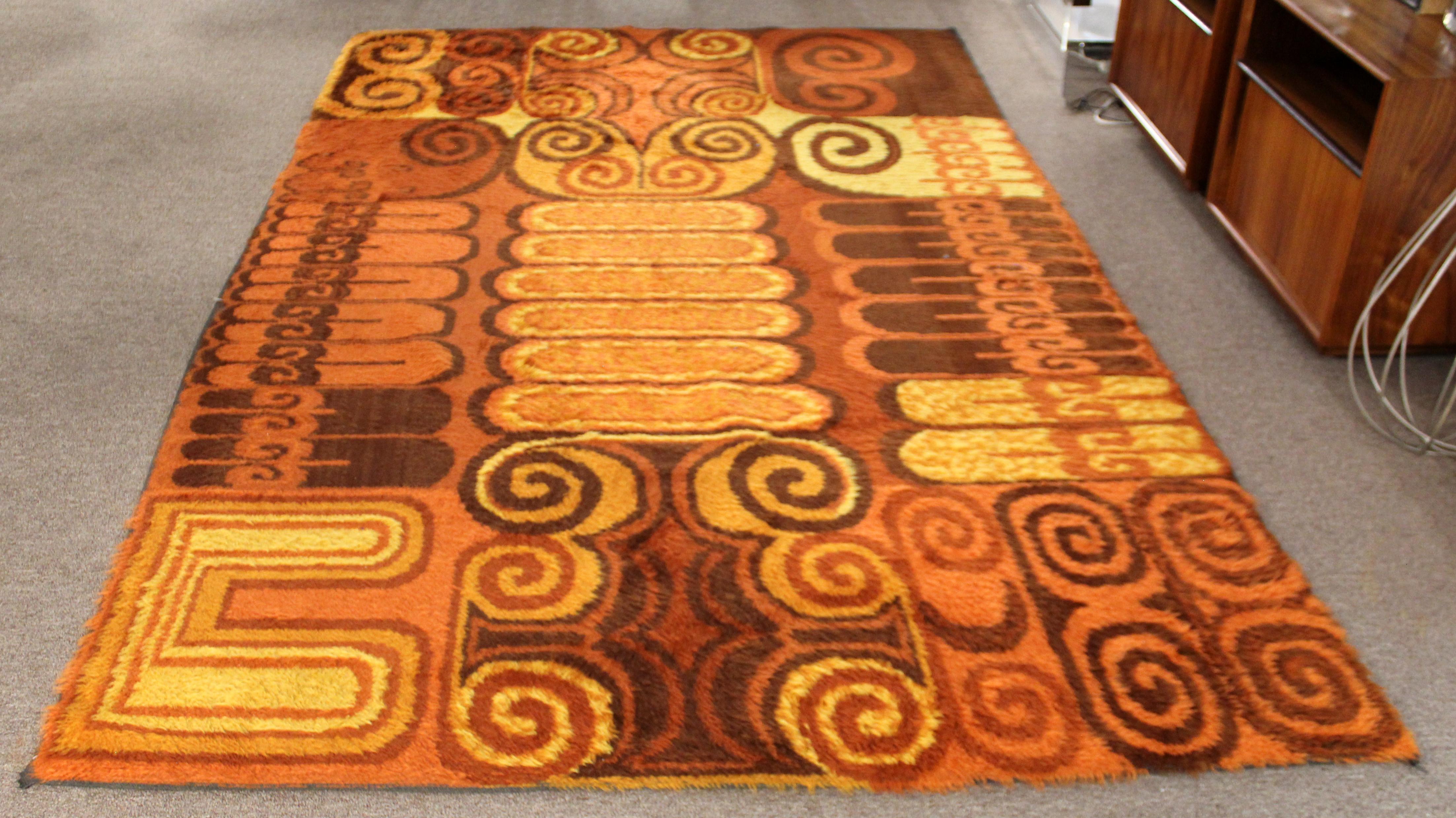 For your consideration is a fabulously groovy, orange patterned rya wool, shag rug, circa 1970s. In very good vintage condition. The dimensions are 71