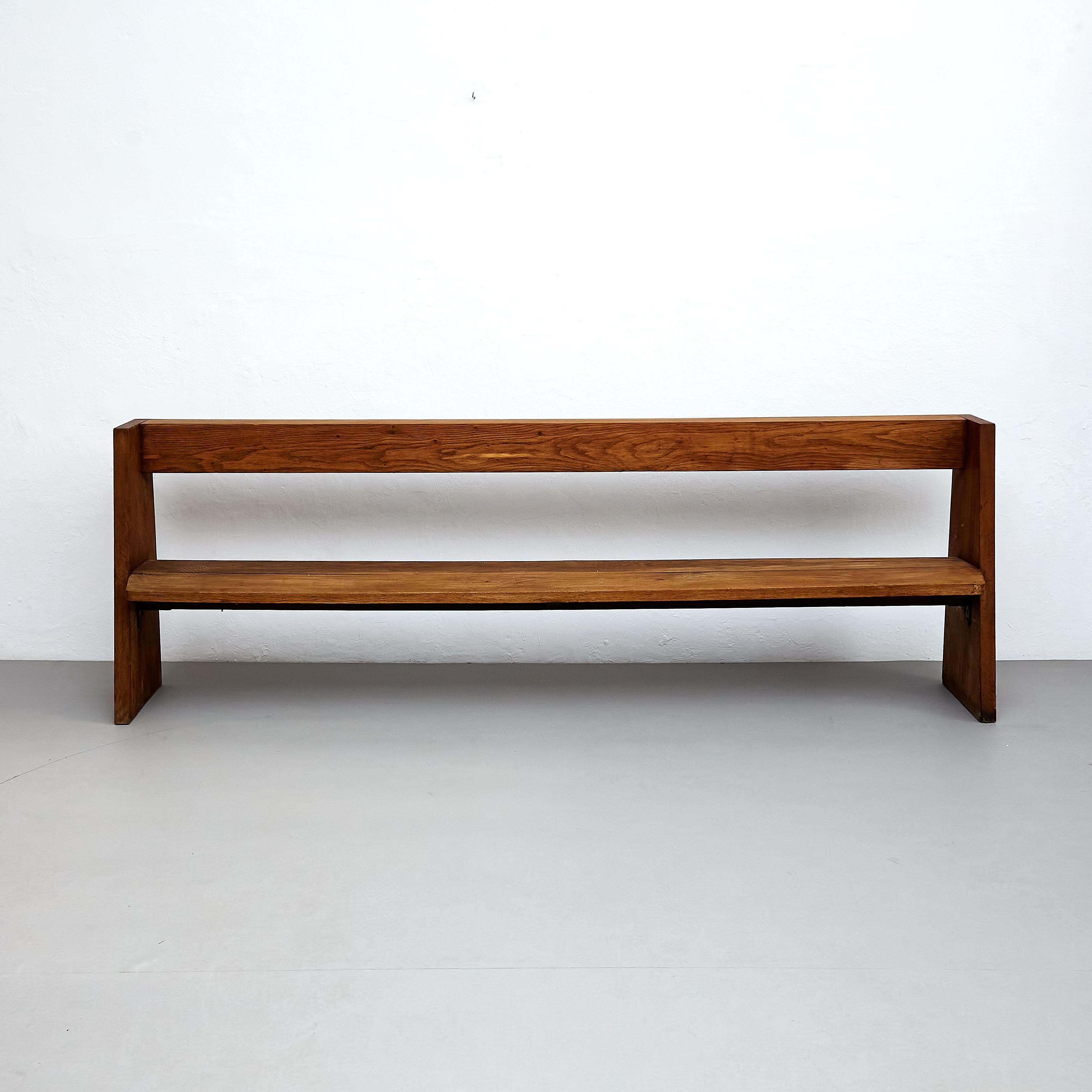 Mid-Century Modern large Rationalist wood bench.

Manufactured in France, circa 1960.

In original condition with minor wear consistent of age and use, preserving a beautiful patina.

Materials: 
Wood

Dimensions: 
D 44.5cm x W 250 cm x H