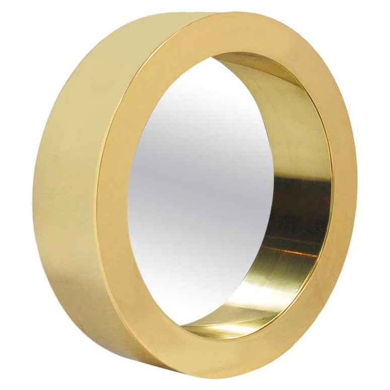 Espejo de pared de ojo de buey redondo, moderno de mediados de siglo, en latón dorado by Curtis Jere en venta