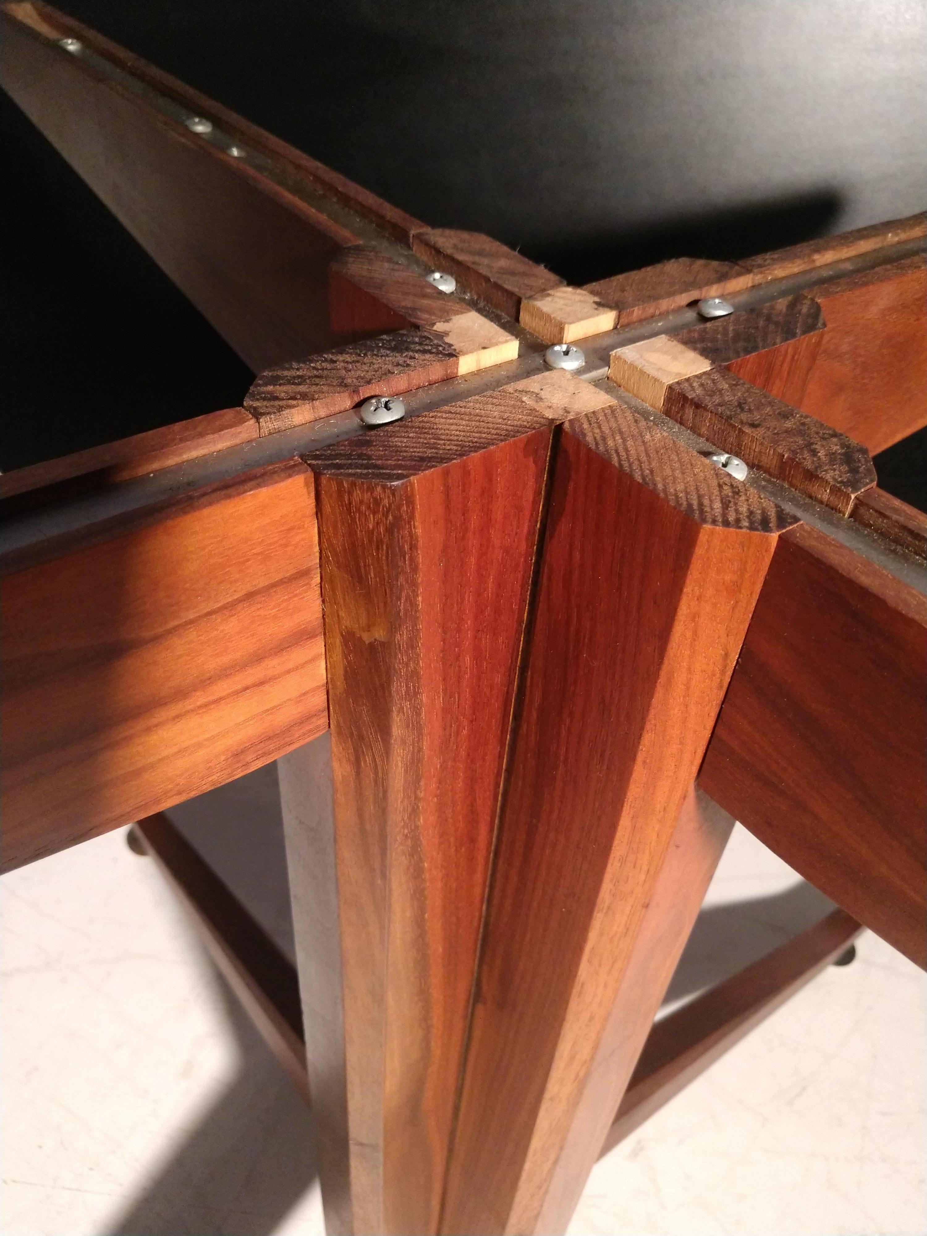 Fabulous large, measures: 48in. black laminate table with a walnut frame and base. In excellent vintage condition with only minor surface wear. Table is made to easily accommodate 4 adults. Top unscrews from base for portability.