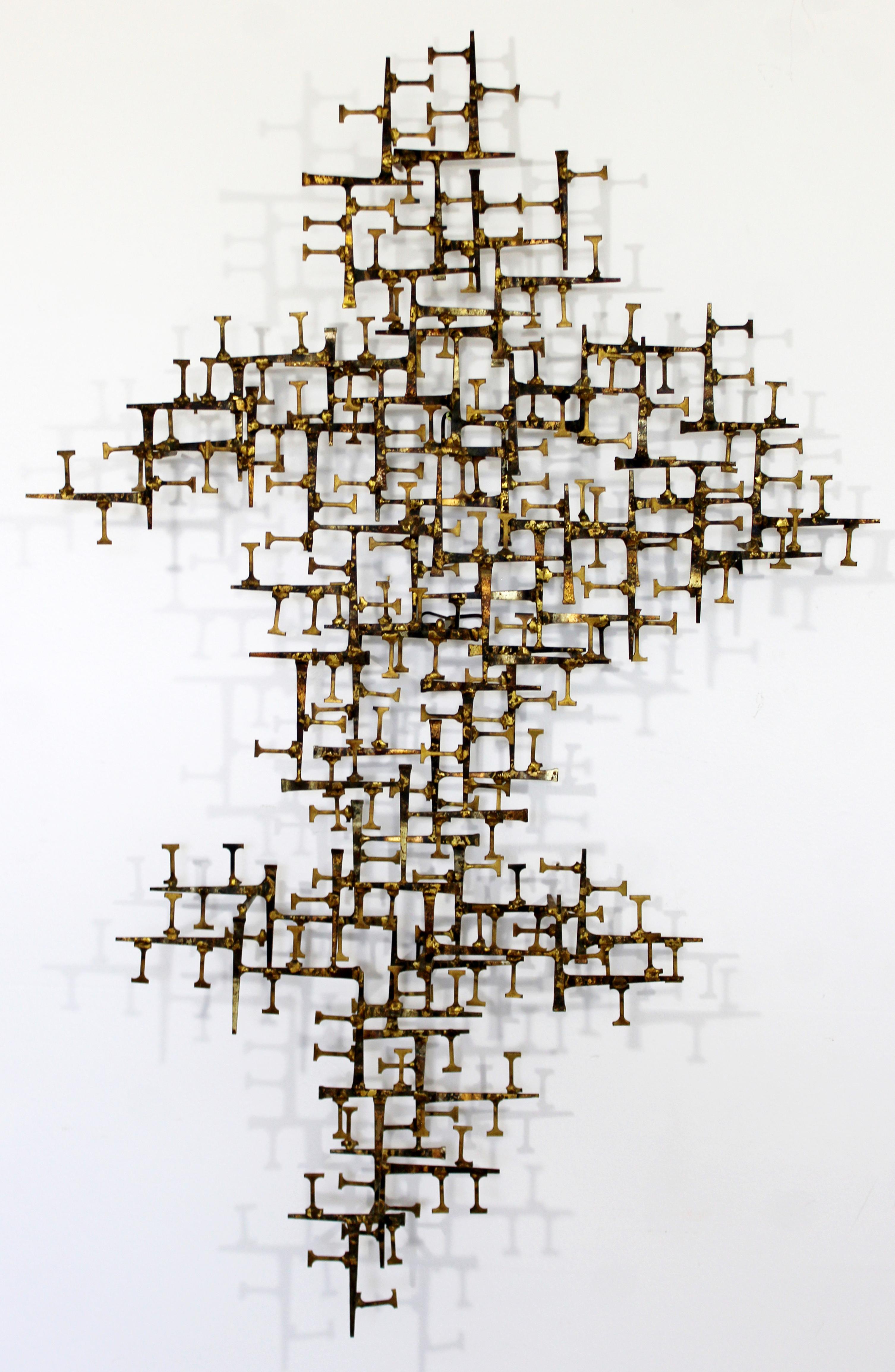 For your consideration is a spectacular, Brutalist nail art wall sculpture, by Schmidt. In excellent condition. The dimensions are 44