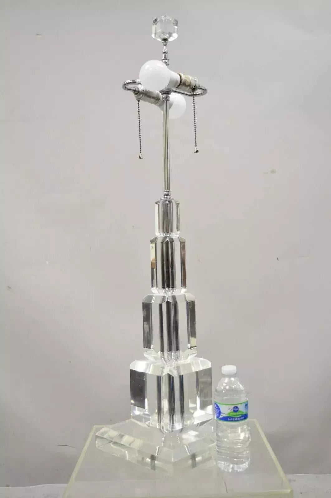Vintage Mid Century Modern Large Stacked Lucite Acrylic Skyscraper Table Lamp by Art-Vue. Item features a large impressive size, chrome mounts, original label, very nice vintage item, great style and form. Circa Mid 20th Century. Measurements: 36.5