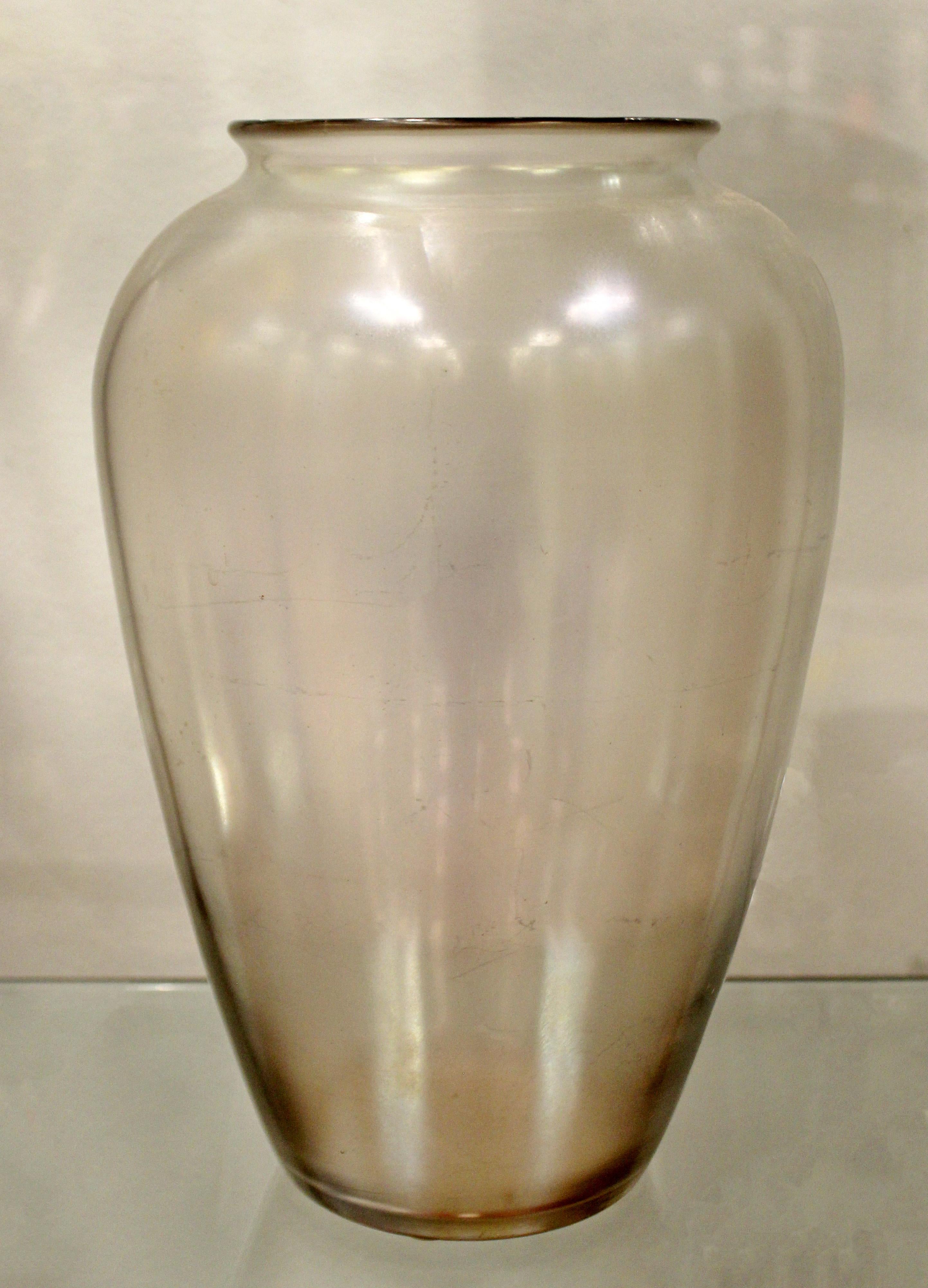 For your consideration is an opaline, iridescent, Steuben glass art vase, circa 1960s. In excellent condition. The dimensions are 7