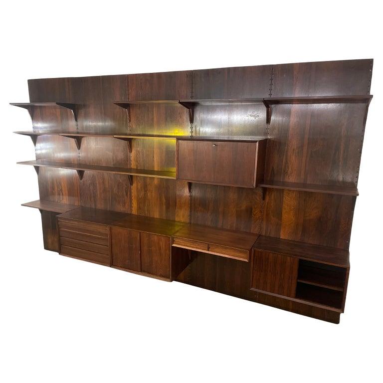 Mid-Century Modern Large Wall Unit by Poul Cadovius for Royal System , 1950s

Poul Cadovius (1911 - 2011) was one of the most colourful and successful persons in the history of Danish furniture industry. He was originally educated as an upholsterer
