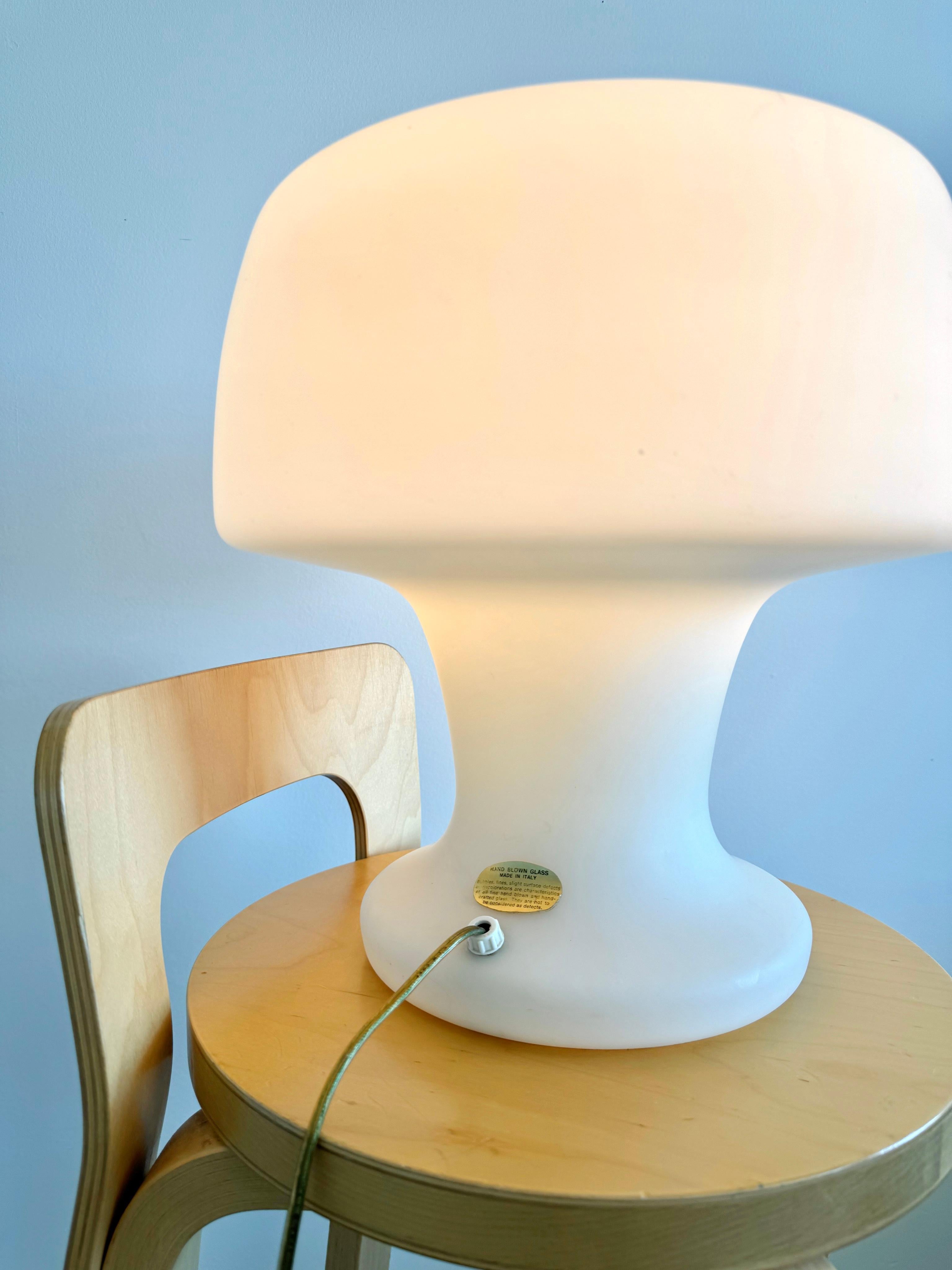 Vintage laurel mushroom table lamp, hand blown and made of one solid piece of frosted Murano glass. Gives off such a beautiful and warm glow. 