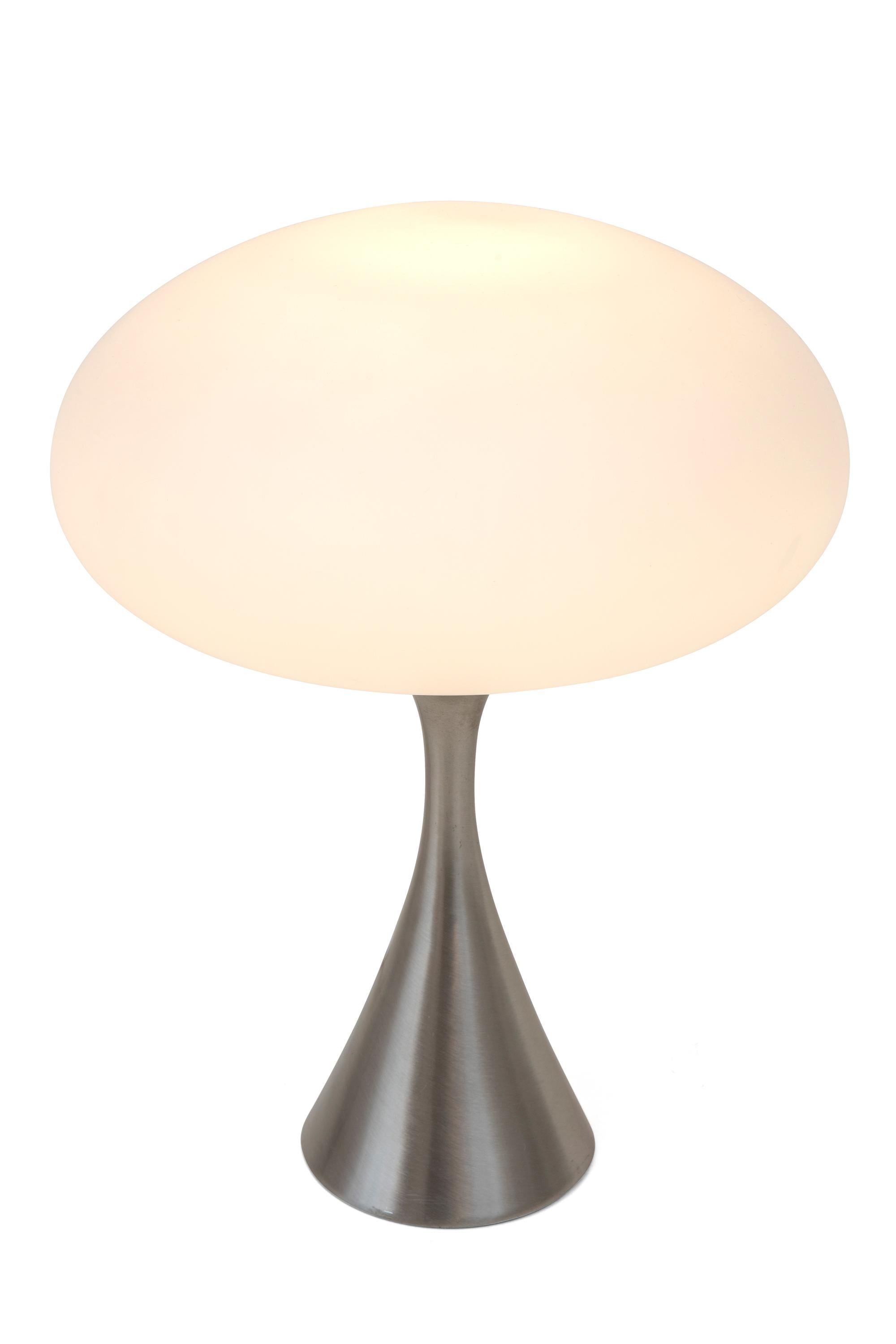 It doesn't get any more iconic than the Laurel Mushroom lamps. This particular lamp has the added appeal of the brushed steel base.