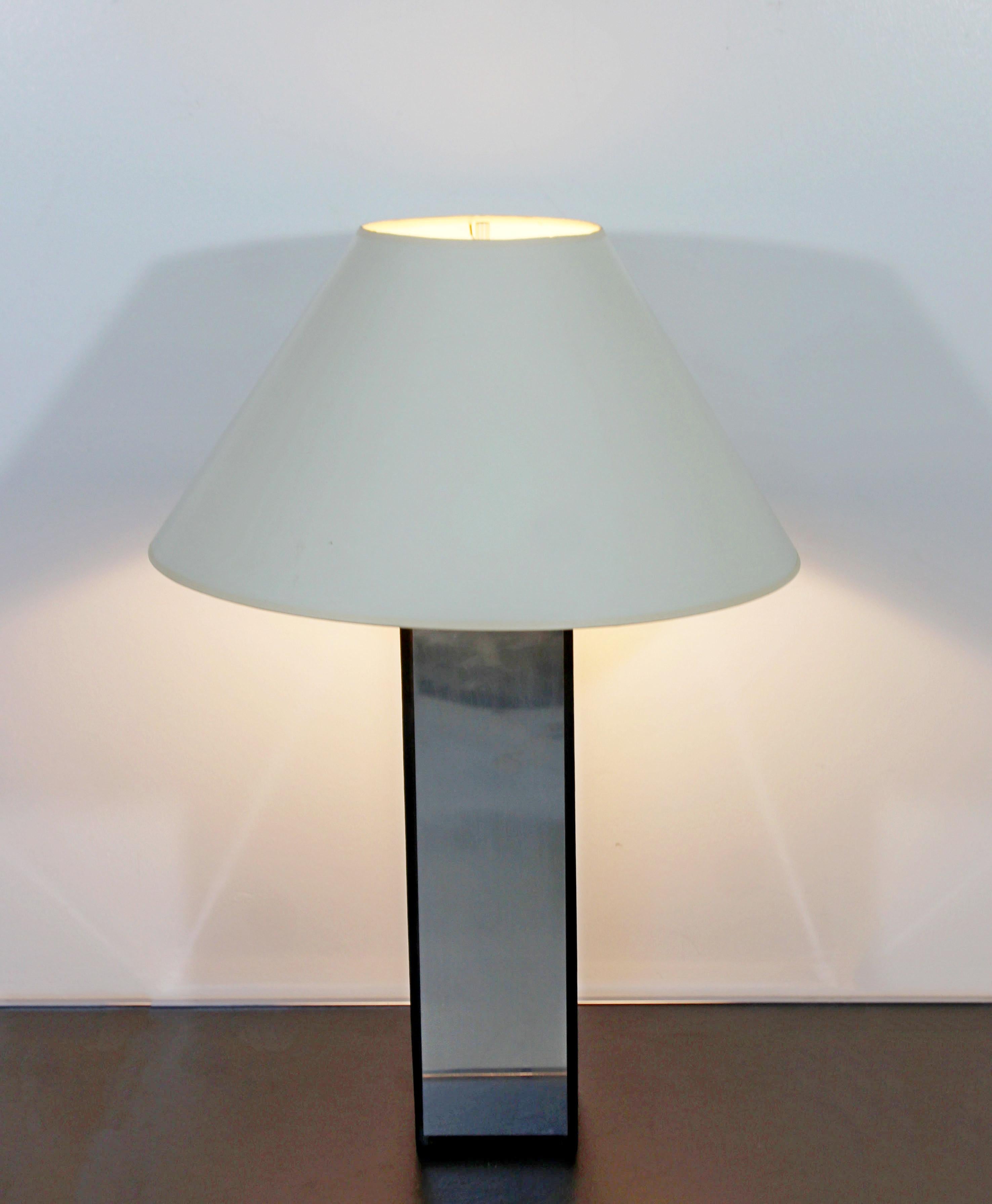 For your consideration is a chic, slate and polished aluminum, table lamp, with original shade and finial, by Laurel Lamp Co., circa the 1970s. In excellent condition. The dimensions of the lamp are 6