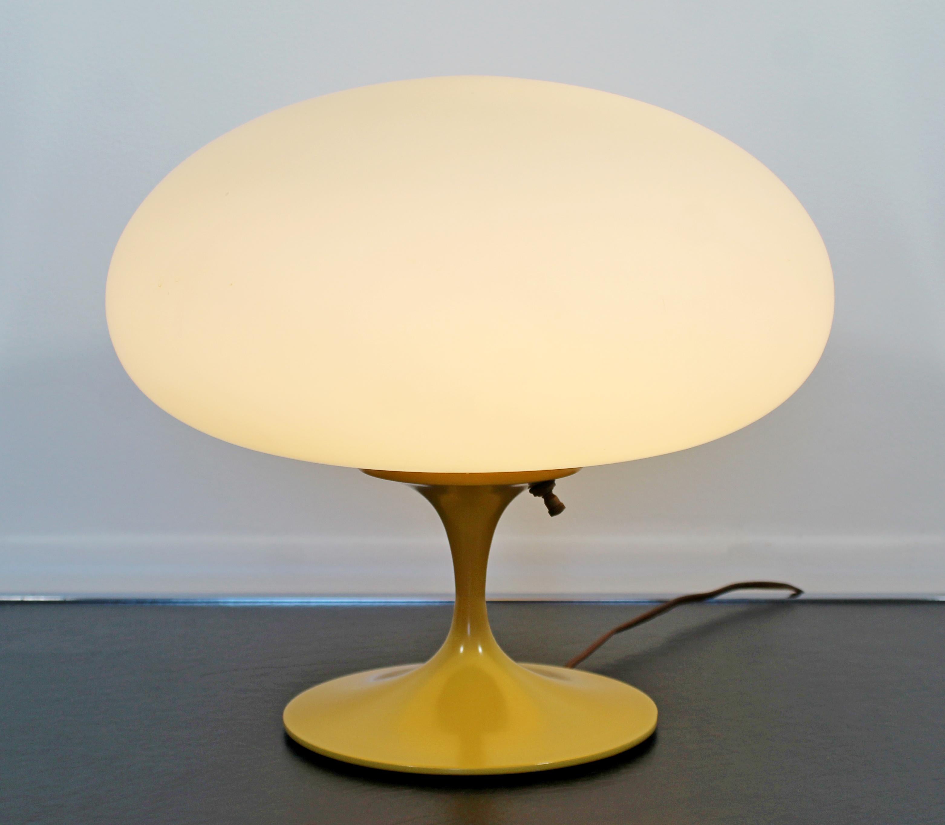 For your consideration is a spectacular, yellow painted metal, table lamp, with glass mushroom top, by Laurel Lamp Co, circa 1960s. In excellent vintage condition. The dimensions are 12