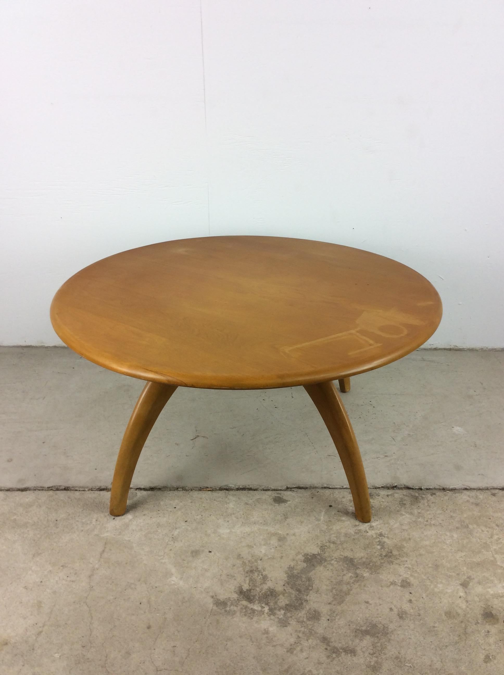 This mid century modern coffee table by Heywood Wakefield features hardwood construction, original champagne finish, swivel top (lazy Susan style), and tall tapered legs.

Check out our other Heywood Wakefield pieces.

Dimensions: 32w 32d 15h



