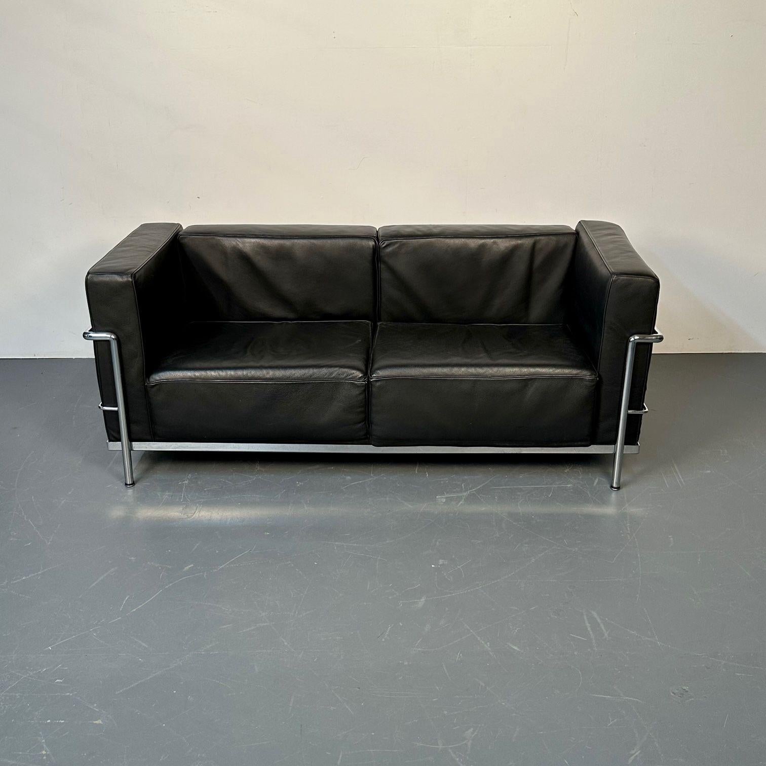 Mid-Century Modern LC2 Sofa by Le Corbusier, Black Leather, Two Seater, Perriand
 
Iconic LC2 two seater sofa originally designed by Le Corbusier, Pierre Jeanneret, and Charlotte Perriand in France, 1928. This sofa is a later re-edition made in