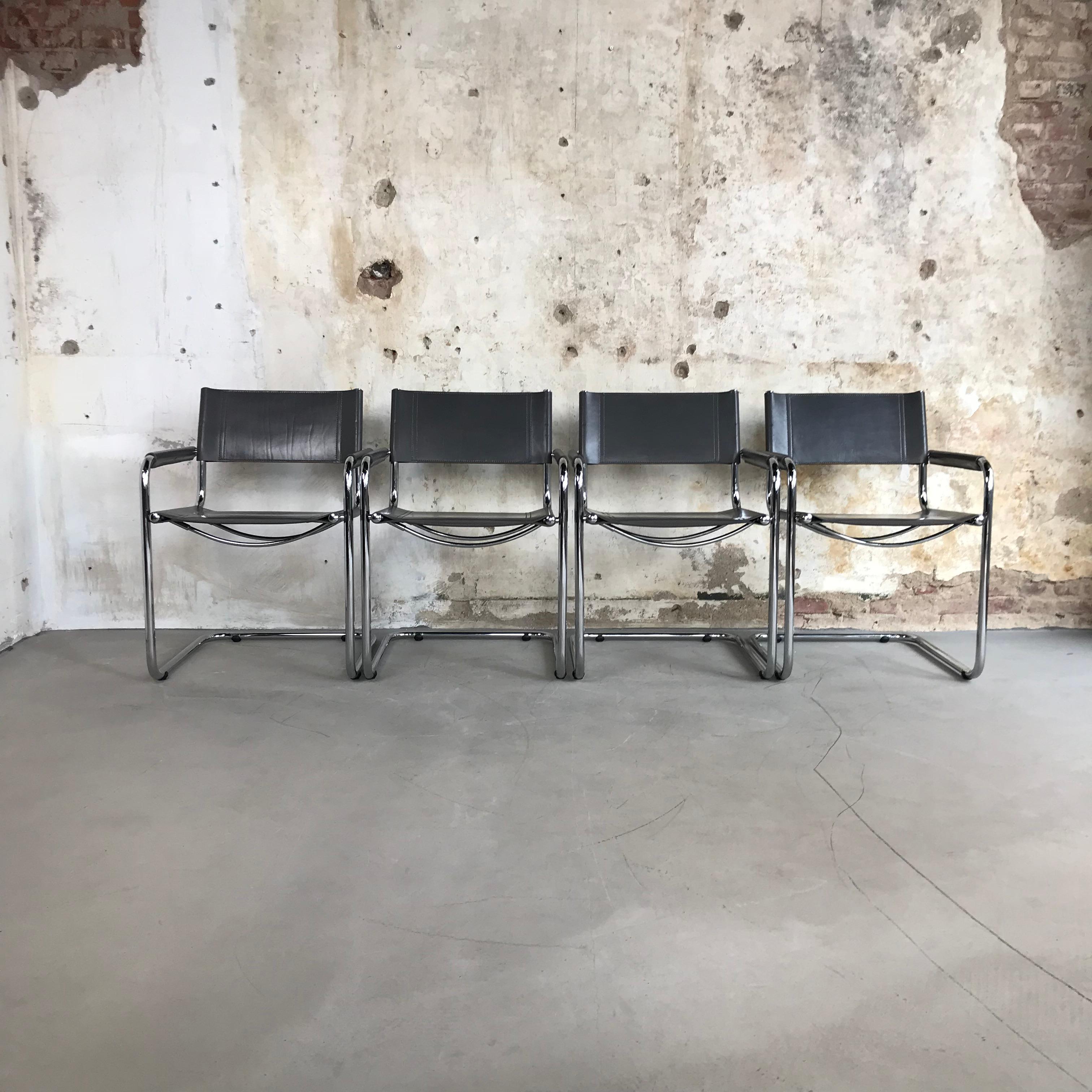 Extremely nice set of four chrome-plated tubular cantilever chairs, originally designed by Dutch architect and master of the Bauhaus Mart Stam. These chairs are produced by Fasem, Italy in 1988.

Beautiful vintage condition, a few spots on one of