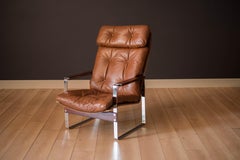 Mid-Century Modern Leather and Rosewood Lounge Chair by Richard Young