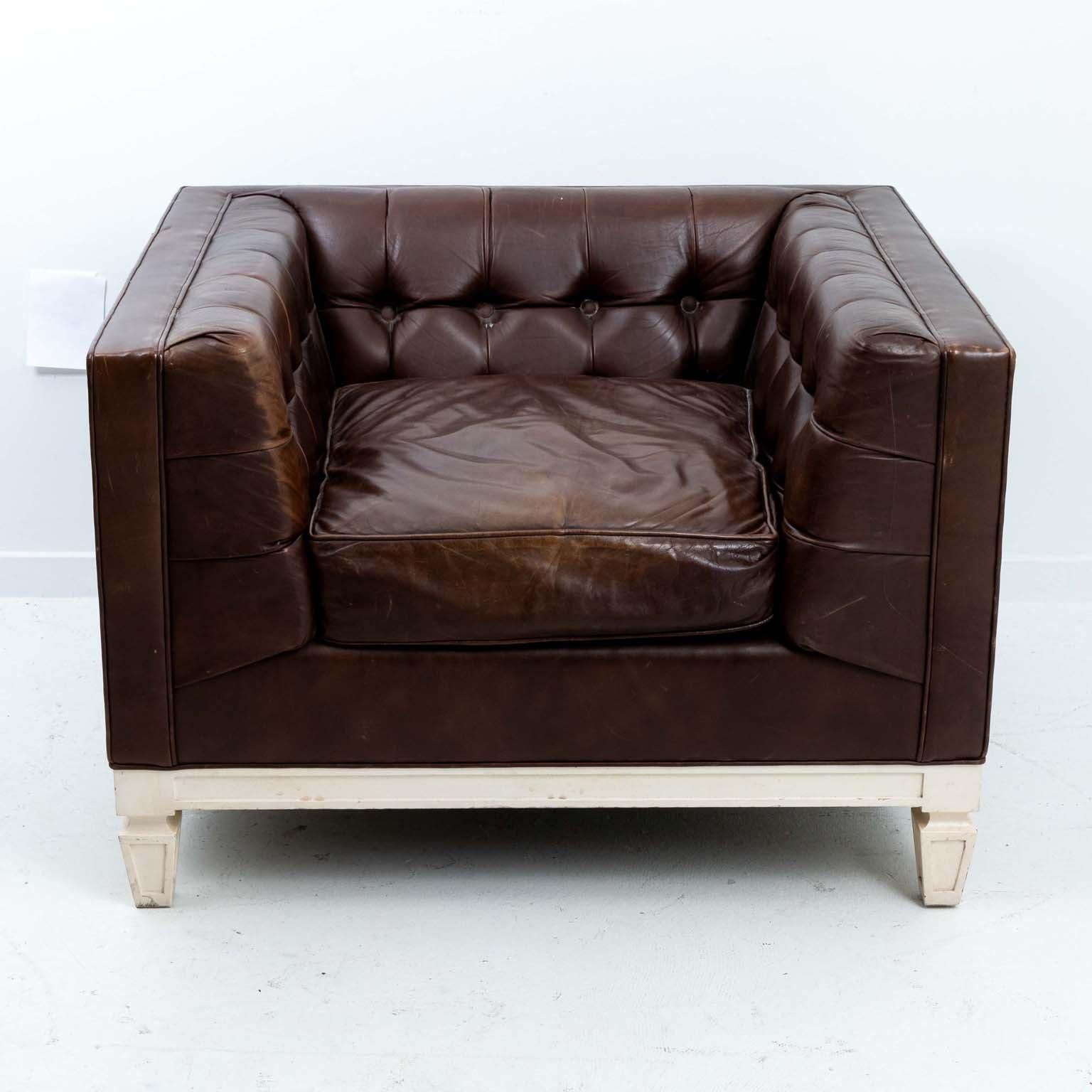 Circa 1960's tufted leather, even armed club chair. Please note of wear consistent with age including wear to the leather. 
