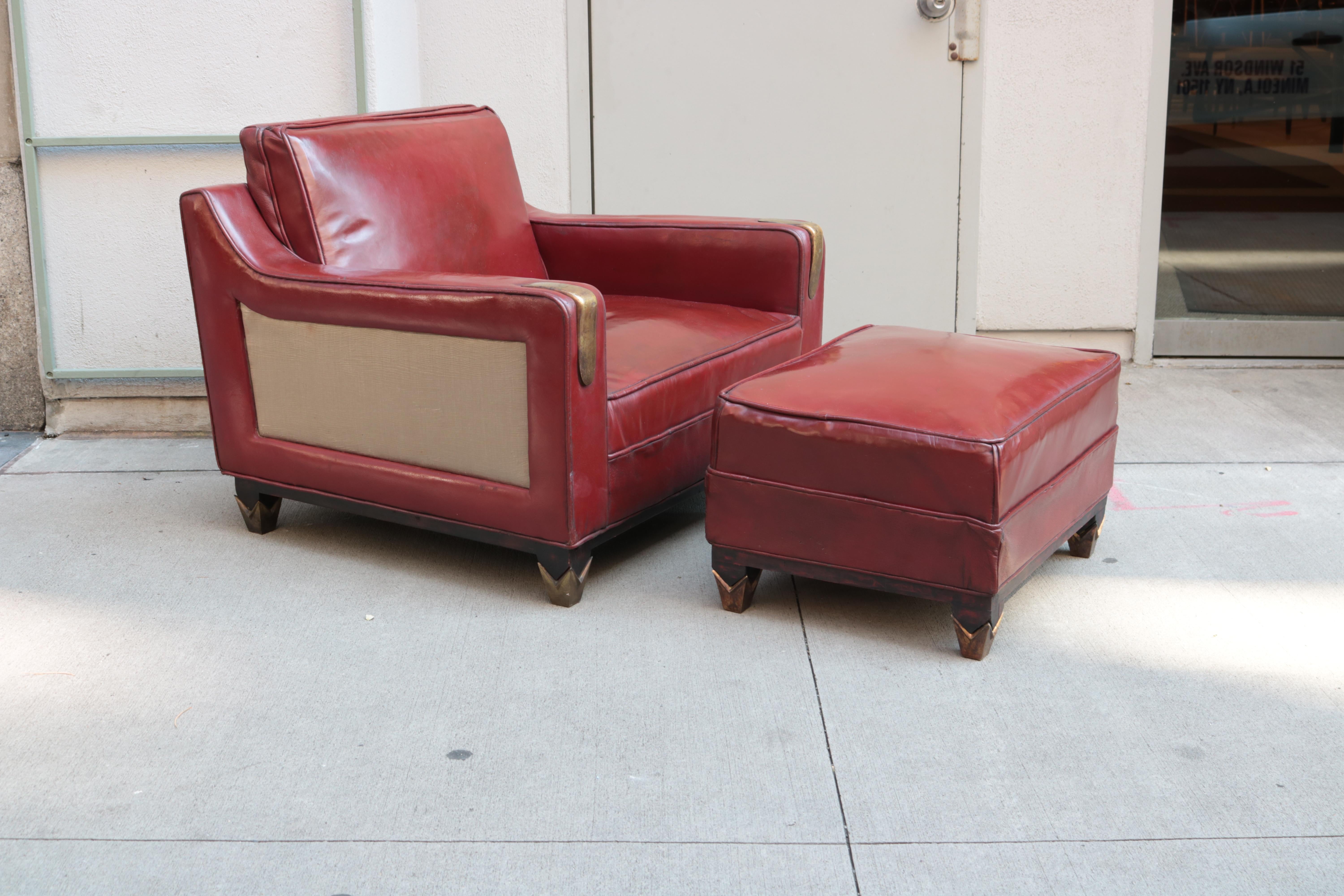 A Mid-Century Modern leather club chair with matching ottoman. 
Attributed to Arturo Pani. 
Original red leather, patinated brass and wood.