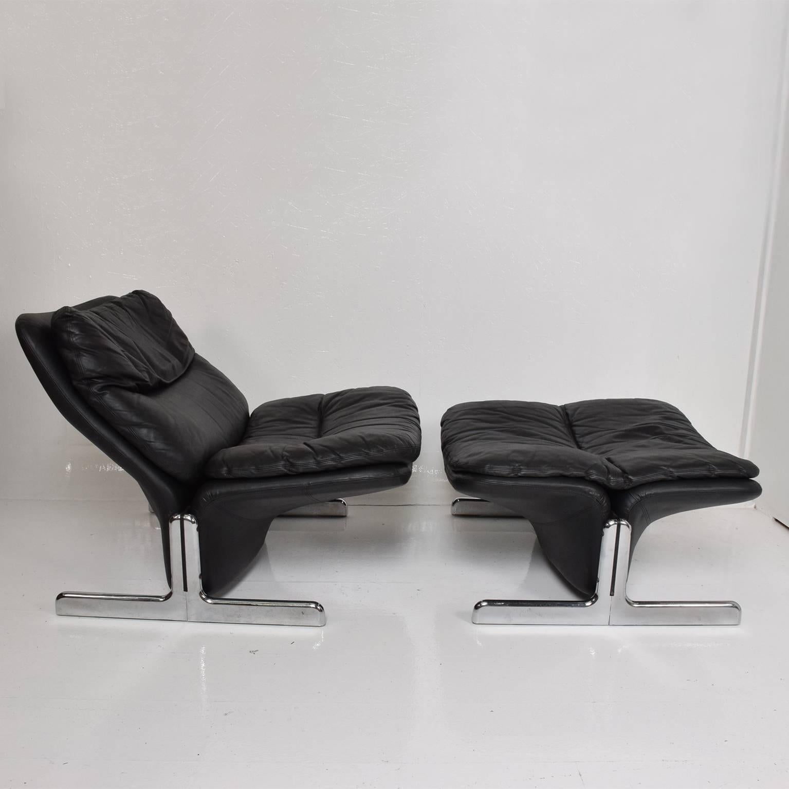 AMBIANIC offering:   1970s Modern Leather Lounge Chair & Ottoman by Tittina Ammannati & Vitelli Giampiero for Brunati in ITALY.

Black Leather & Chrome plated steel. Midcentury Modern Mad all the way.
Dimensions: Chair 28 1/2