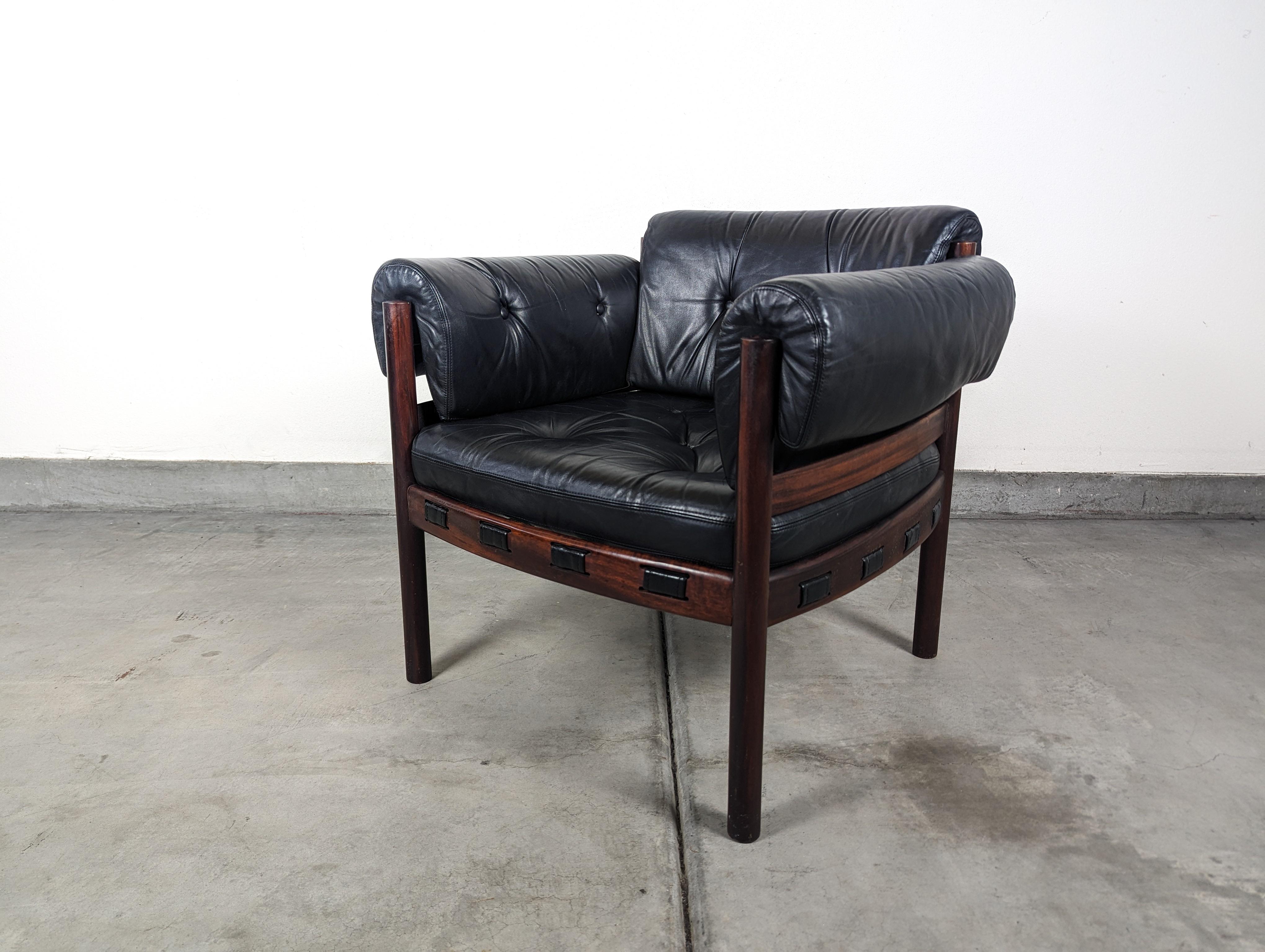 Swedish Mid Century Modern Leather & Rosewood Lounge Chair by Arne Norell, c1960s For Sale