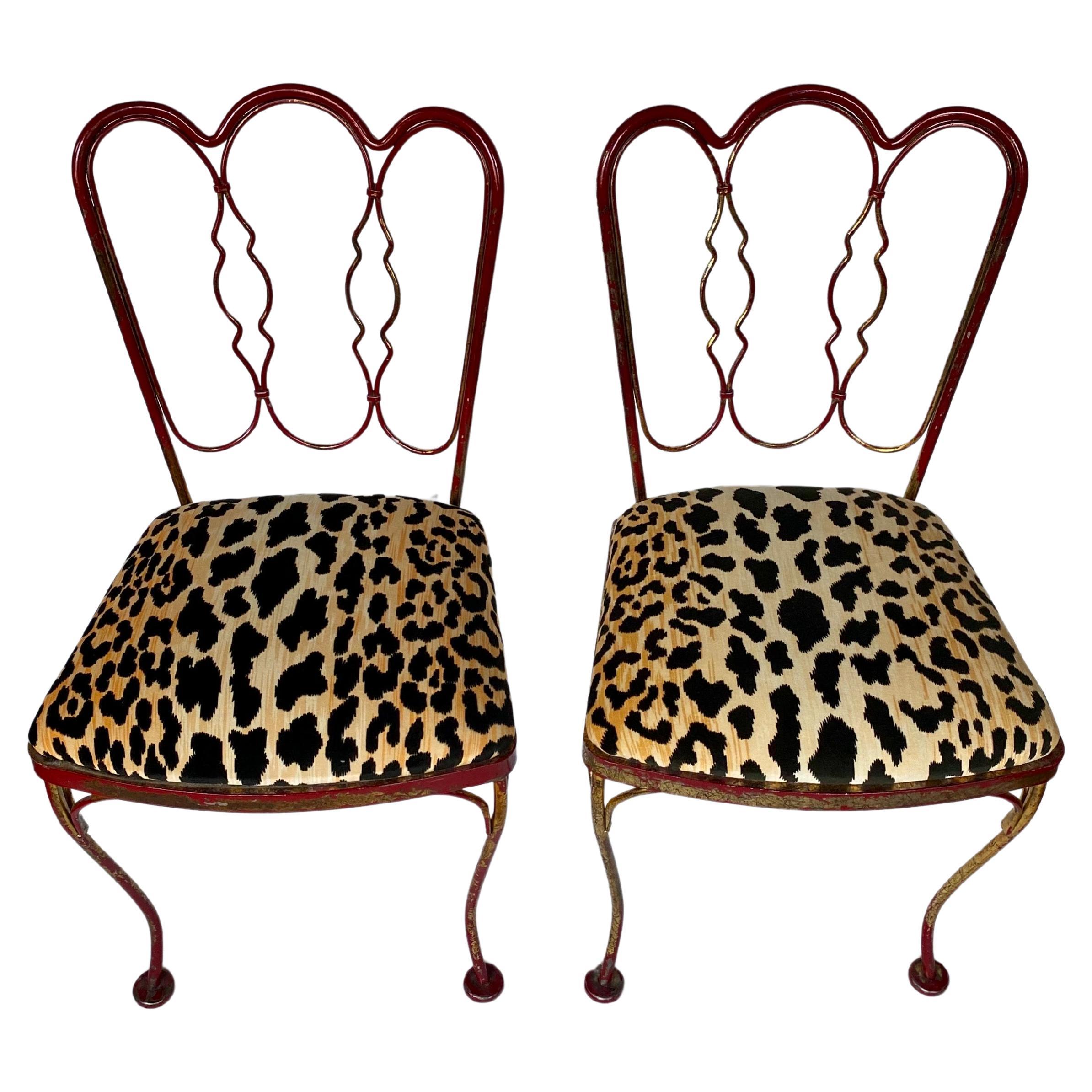 Mid-Century Modern original Lee Woodard side chairs with gilt and red painted finish.  These Salterini French style wrought iron accent chairs have been reupholstered in a fabulous cotton velvet animal print fabric.  One chair is imprinted with the