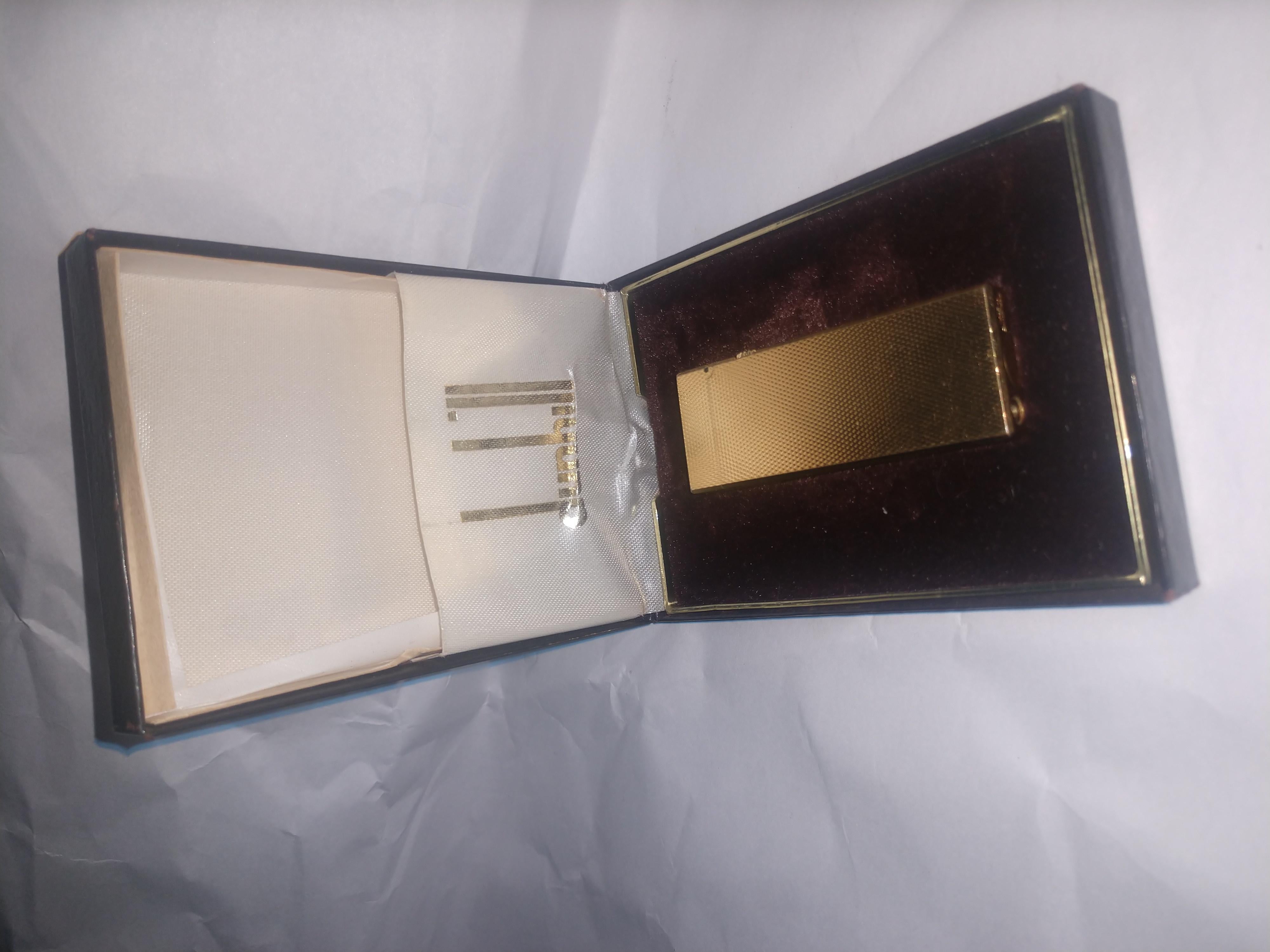 Fabulous and hardly used. Dunhill Rollagas Rulerlite butane lighter made in Switzerland. In original case with 3 booklets. Excellent vintage condition with minimal wear.