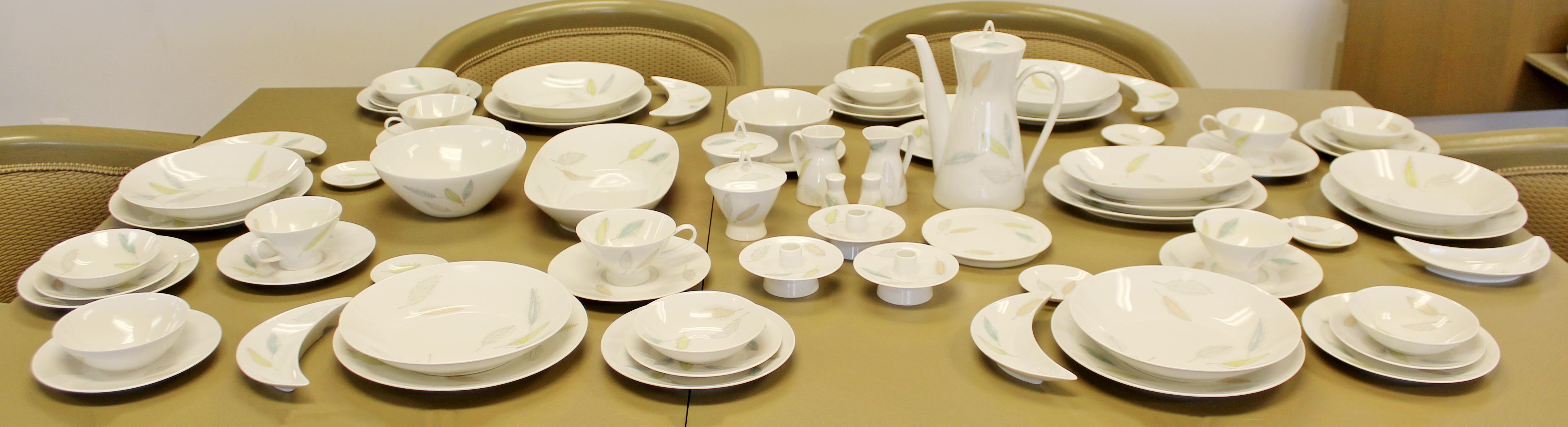 For your consideration is a simple and stunning, porcelain ceramic dinnerware set, with a multi-colored leaf motif, Form 2000 by Raymond Loewy for Rosenthal, made in Germany, circa 1950s. The set is called Colored Leaves. Set includes ten dinner