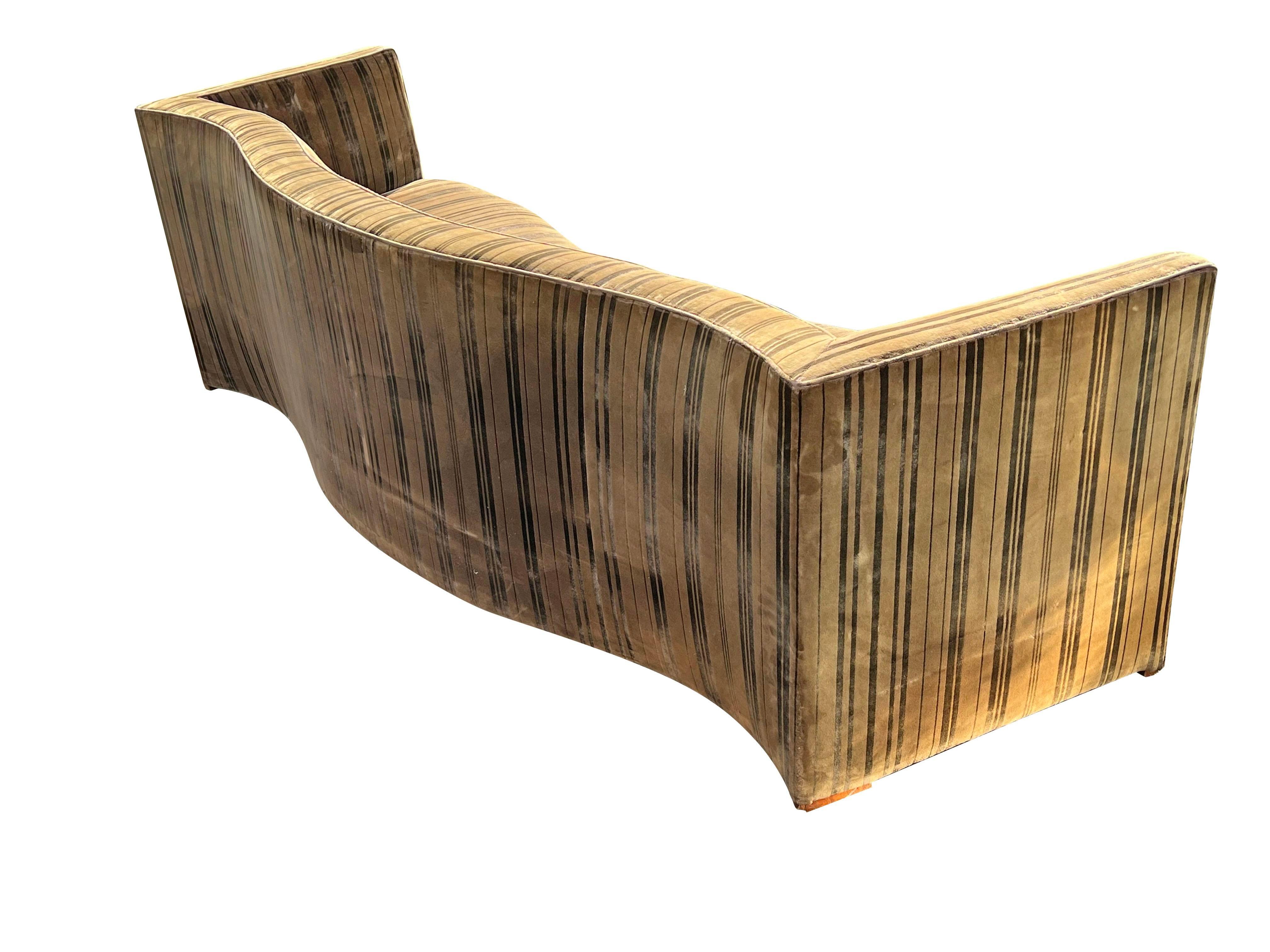 Monumental Vintage Mid-Century Modern Long Curved Sofa.

Indulge in mid-century modern luxury with this stunning monumental curved sofa. Inspired by the iconic designs of Harvey Probber, Dunbar, and Milo Baughman, this piece offers a unique blend of
