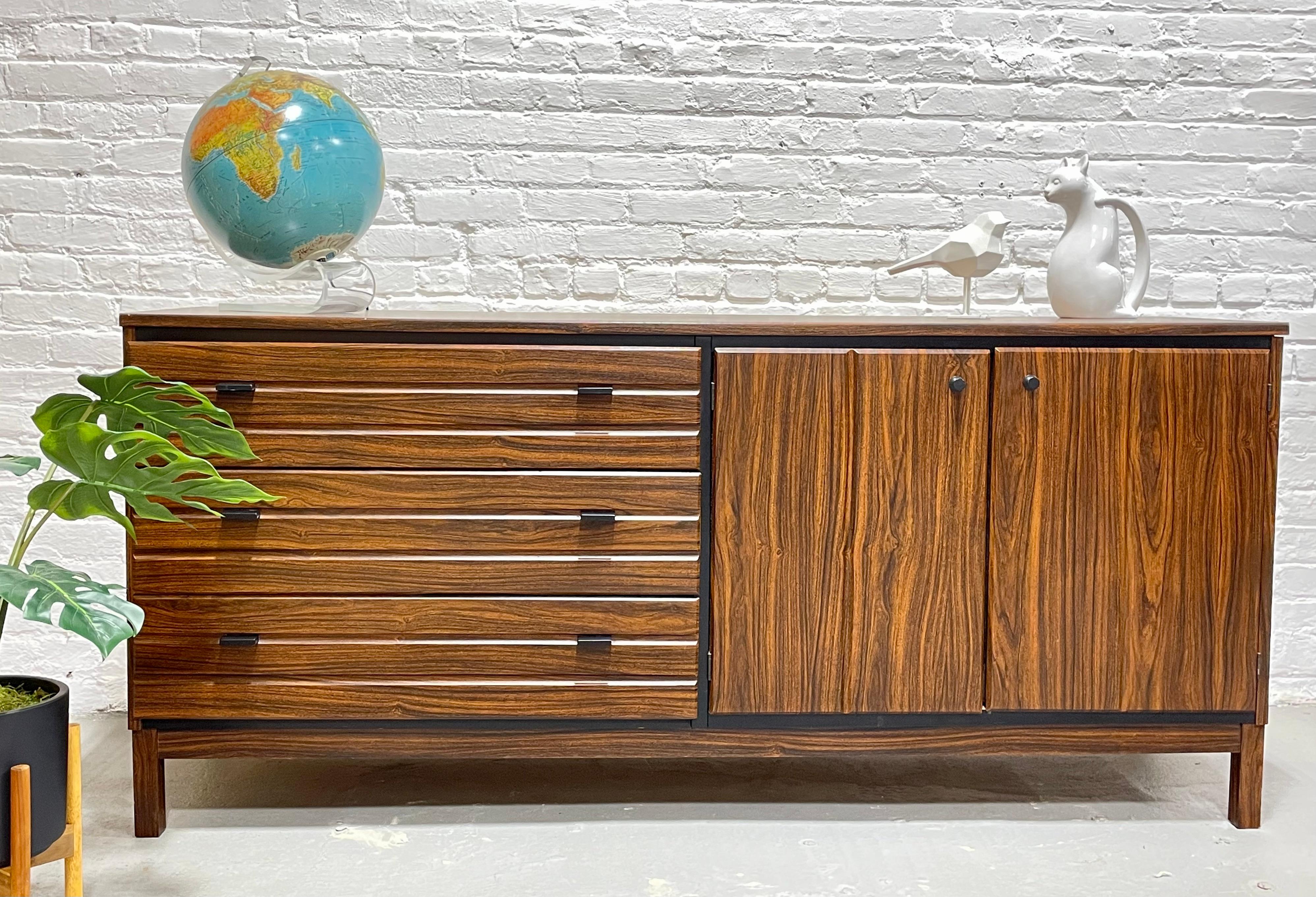 Mid Century Modern Long Dresser / Credenza by American of Martinsville, a solid American manufacturer known for their superb quality, c. 1960's. This long dresser offers loads of storage space over a total of 6 wide and spacious drawers.  The