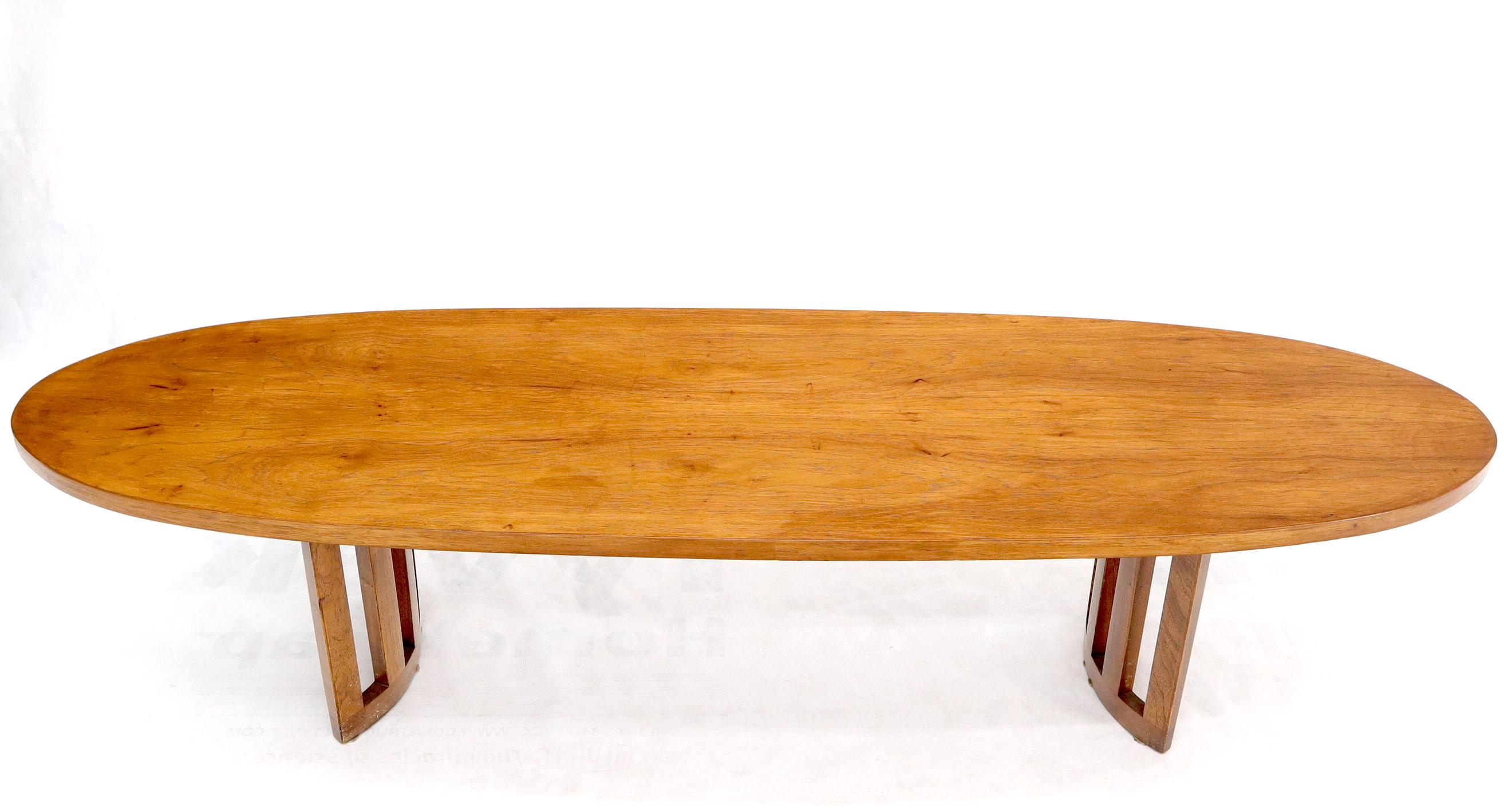 Mid-Century Modern long oval surf board shape coffee table.