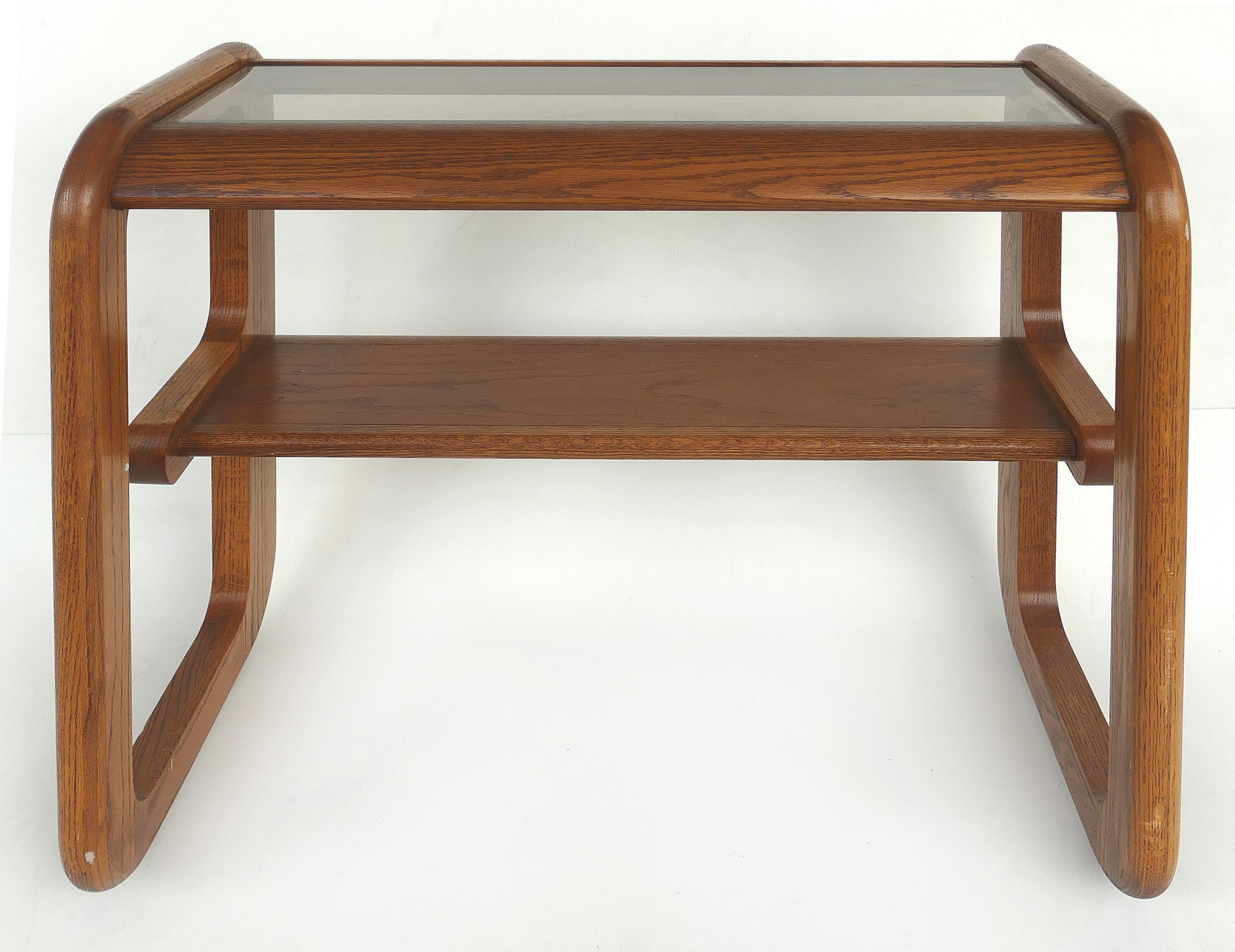 Mid-Century Modern Mersman Hodges Style Console Table, California Design

Offered is a 1960s California Mid-Century Modern oak and inset beveled glass console/sofa two-tiered table that is actually by Mersman Furniture. The table has an inset