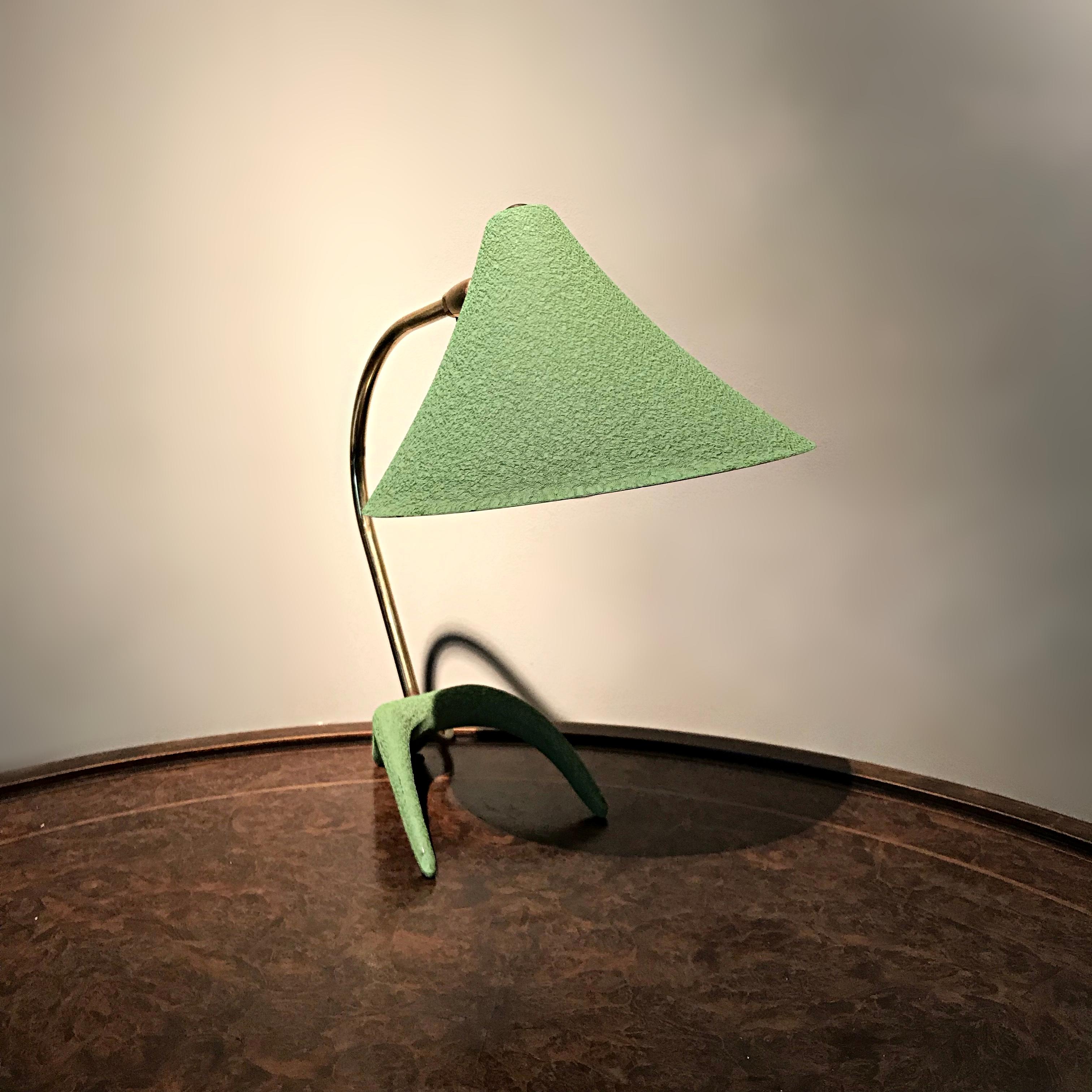 Beautiful Mid-Century Modern Philips table lamp designed by Louis Kalff. Made of wrinkle painted metal shade and base with polished brass swan neck.
Very good, newly rewired, fully working and tested condition.

 