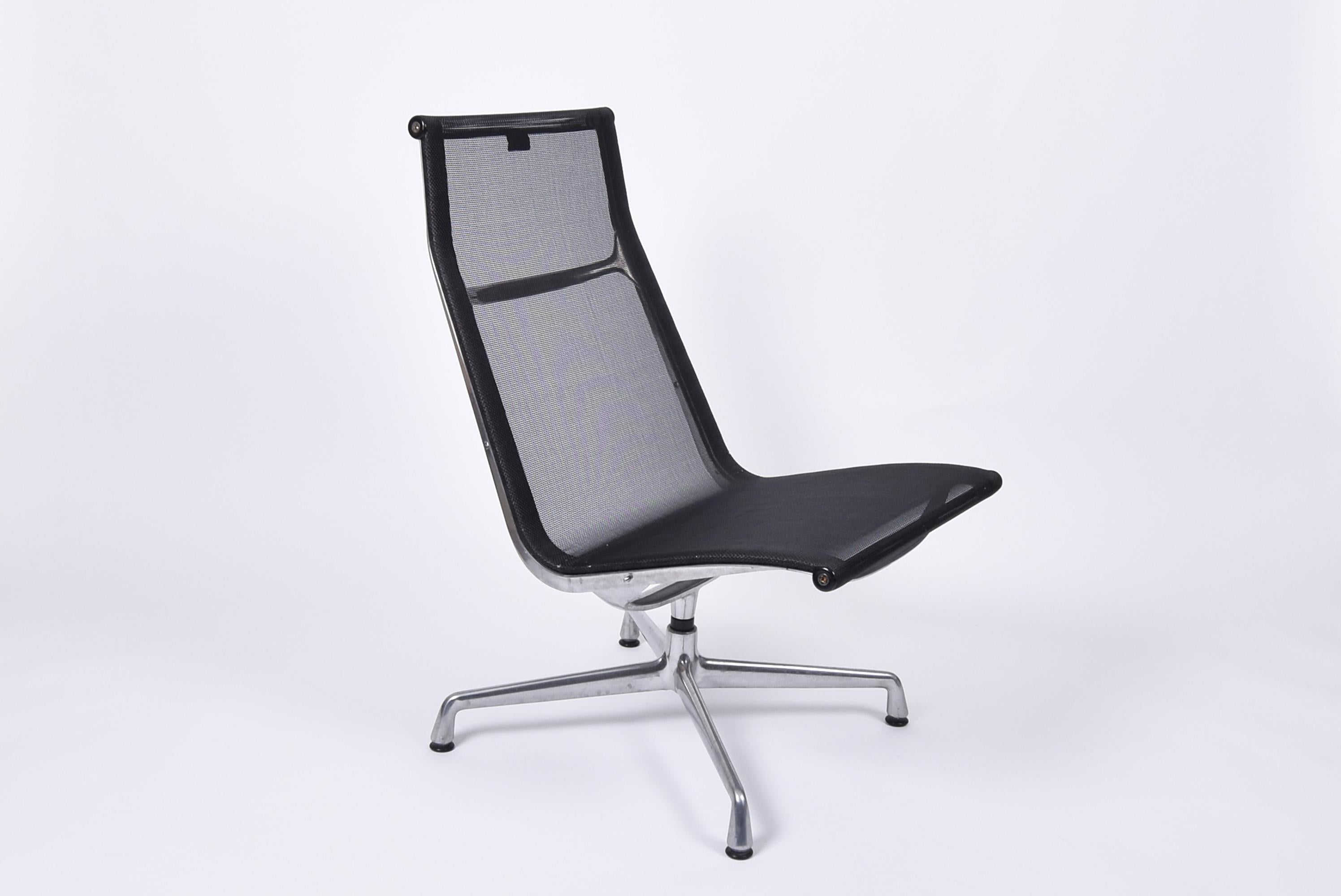 Mid-Century Modern lounge chair ea 115, designed in 1958 by Charles and Ray Eames.
Produced by Vitra.
Aluminium base and black net seat.
 
