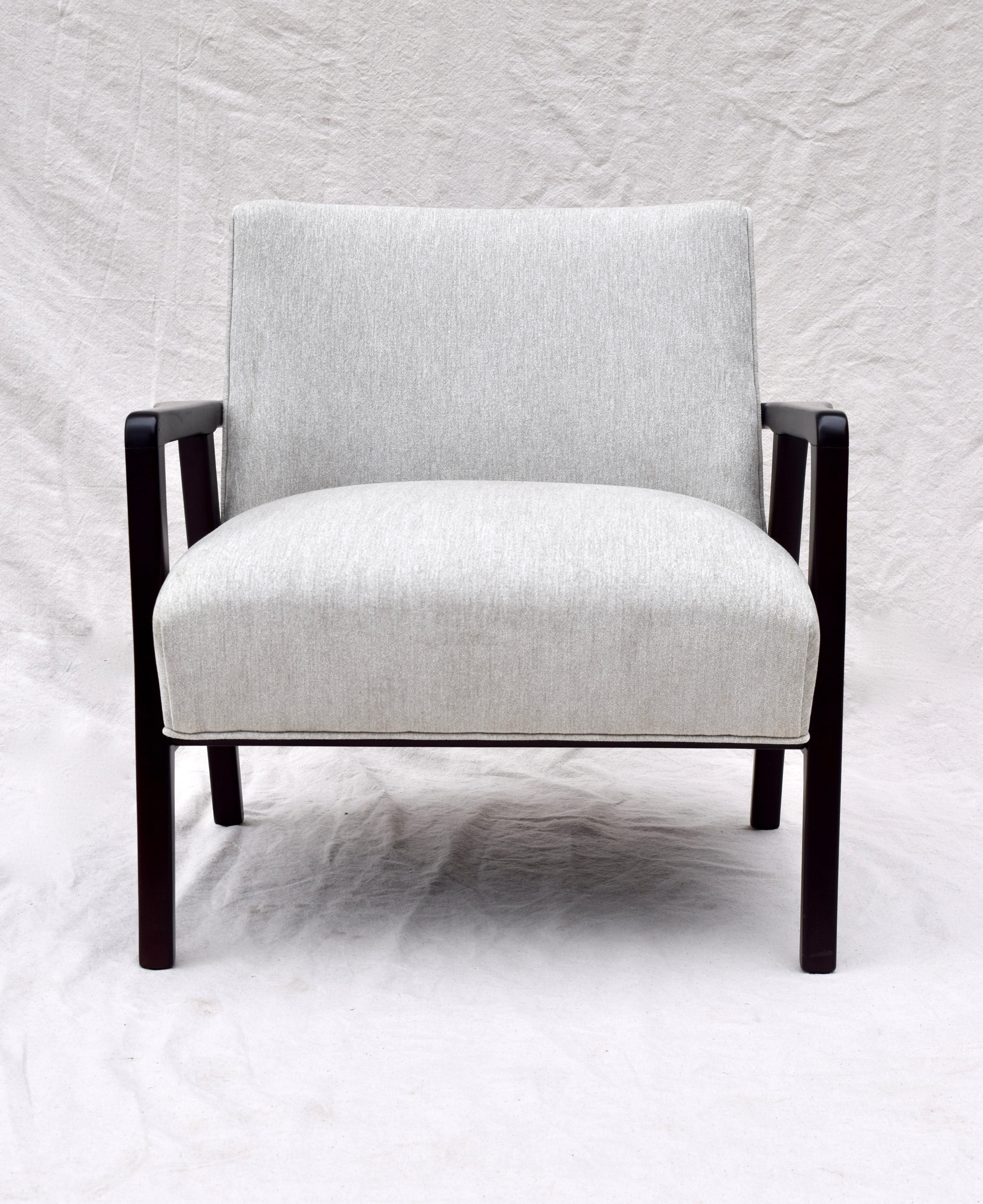 Fully restored 1950s lounge chair of extraordinary construction. This popular midcentury and Danish Modern style can also be seen in the works of Edward Wormley for Dunbar & Widdicomb Designs. With careful attention to maintain the re-tied spring