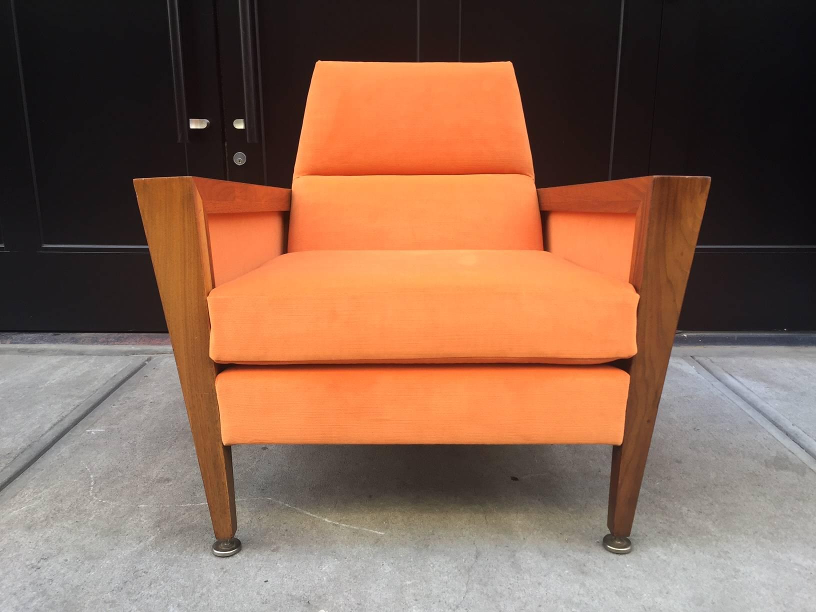 Mid-Century Modern lounge chair manner of Jens Risom. Newly upholstered in orange velvet. Walnut frame.