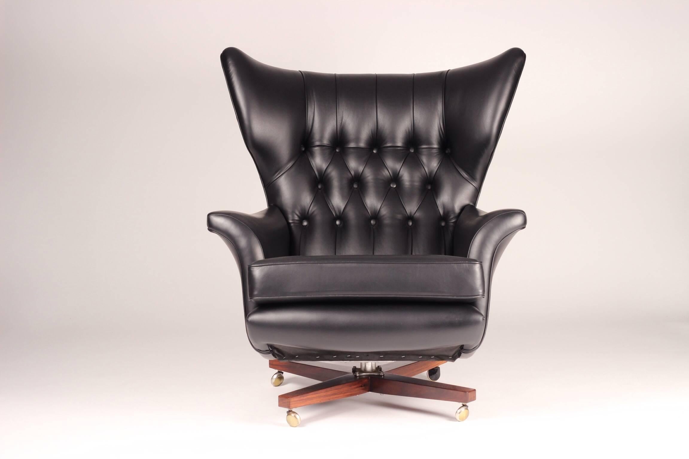 Once described as 'the worlds most comfortable chair' this recently reupholstered piece in fine Italian black leather will surely bring out your inner Bond Villain. Appearing in original black the model 62 was used in The Bond movie 'You only live