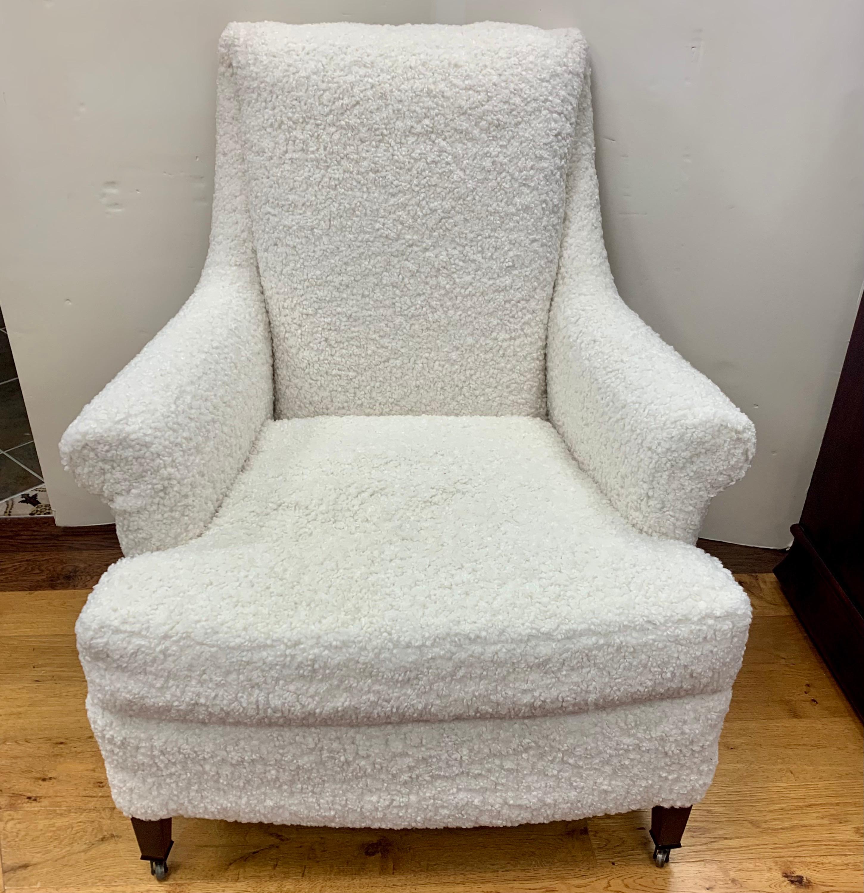 Stunning 1970's Mid-Century Modern lounge chair newly upholstered in a thick boucle fabric. Nothing short of stunning and so comfortable. Now, more than ever, home is where the heart is.