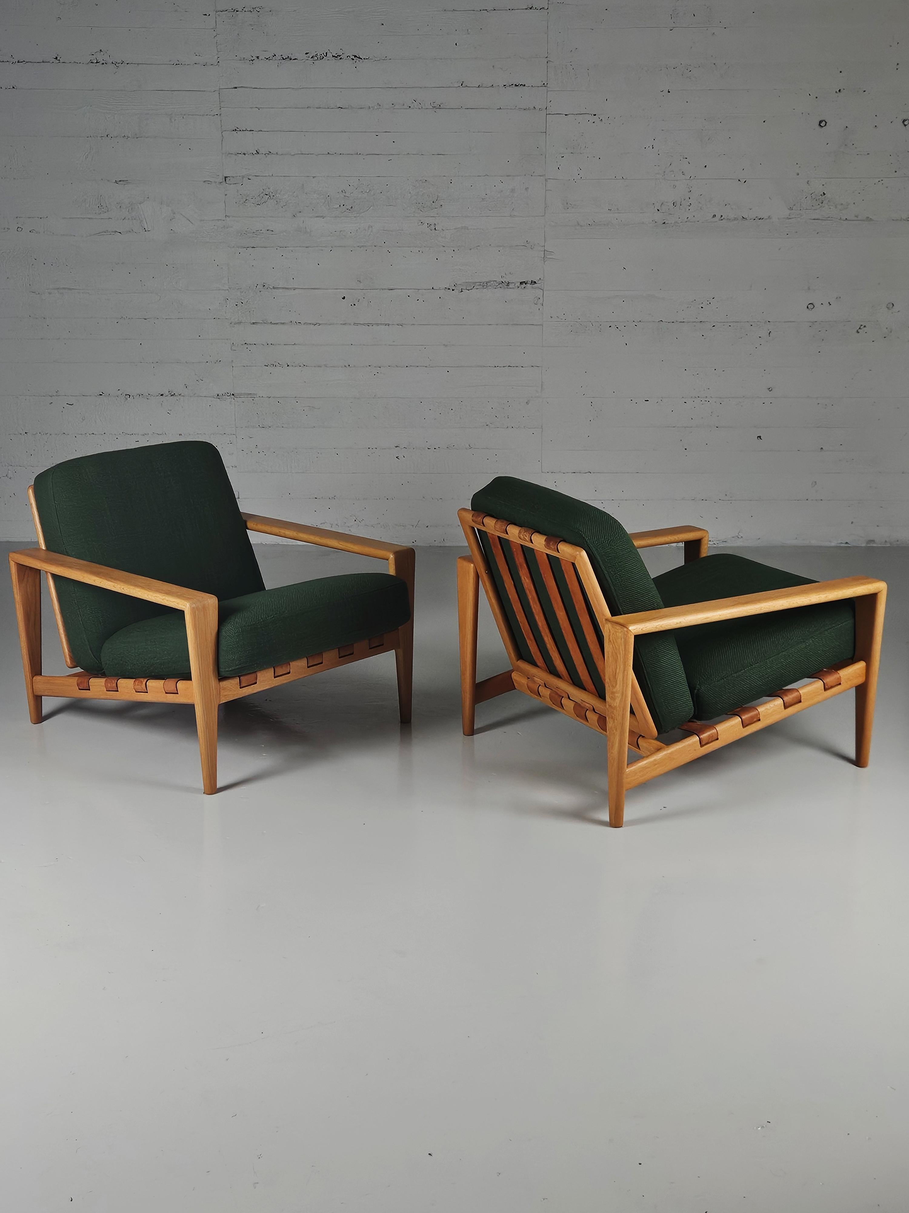 Pair of 'Bodö' lounge chairs designed by Svante Skogh in Sweden in 1957. 

Modernistic design in oak, leather and fabric. Beautiful silhouette.