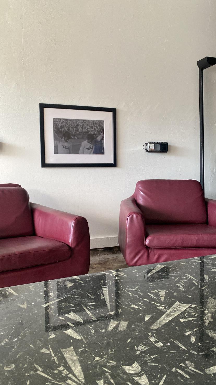 Amazing pair of mid century modern lounge chairs in a maroon leather. This piece  boast clean lines and smooth curves. I was told they are Italian but I have to proof for confirm. 

29.5” depth 
31” width 
27” height 
23” seat depth 
16” seat height