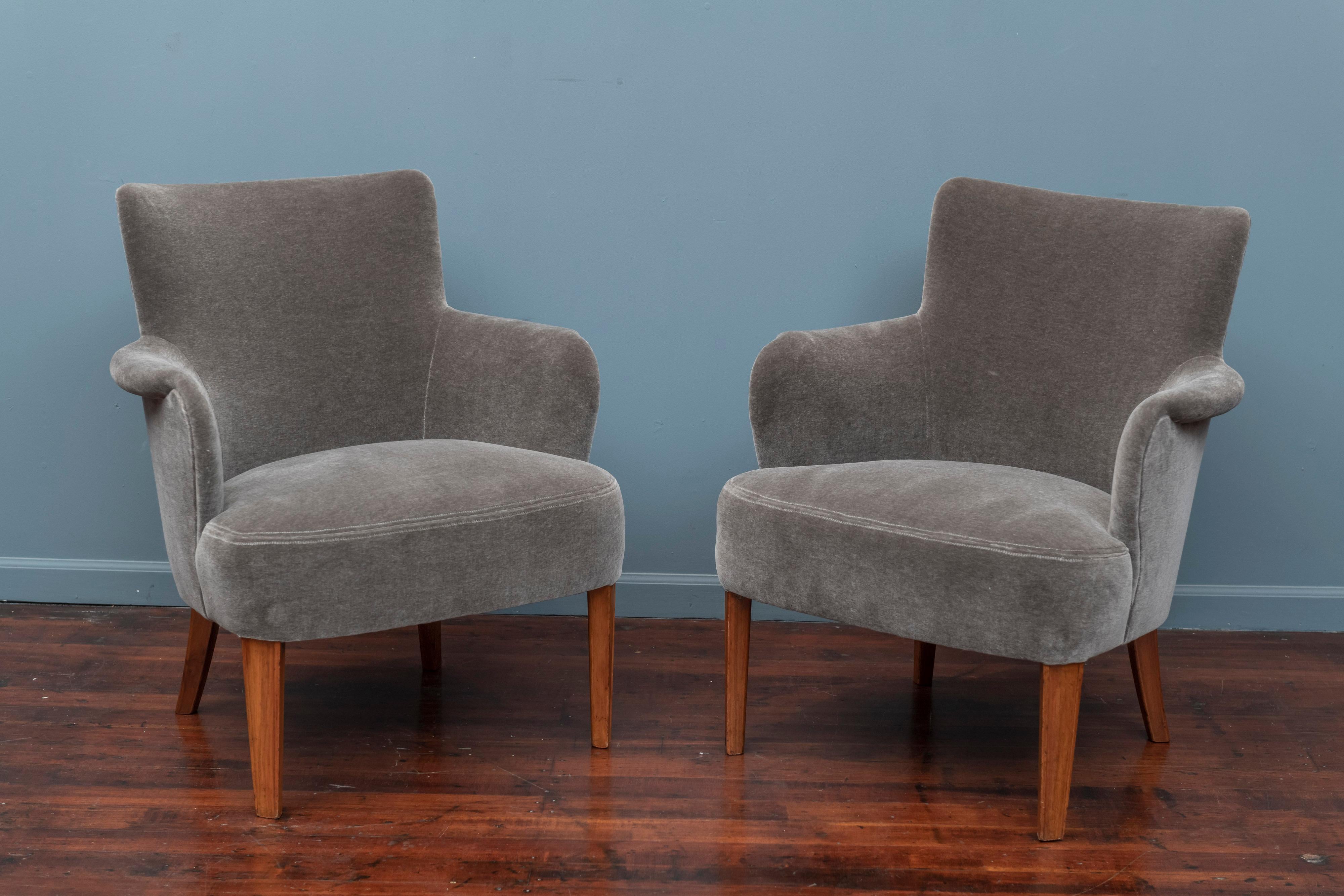 Mid-Century Modern Swedish lounge chairs in the style of Carl Malmsten, newly upholstered in charcoal grey mohair and ready to enjoy.