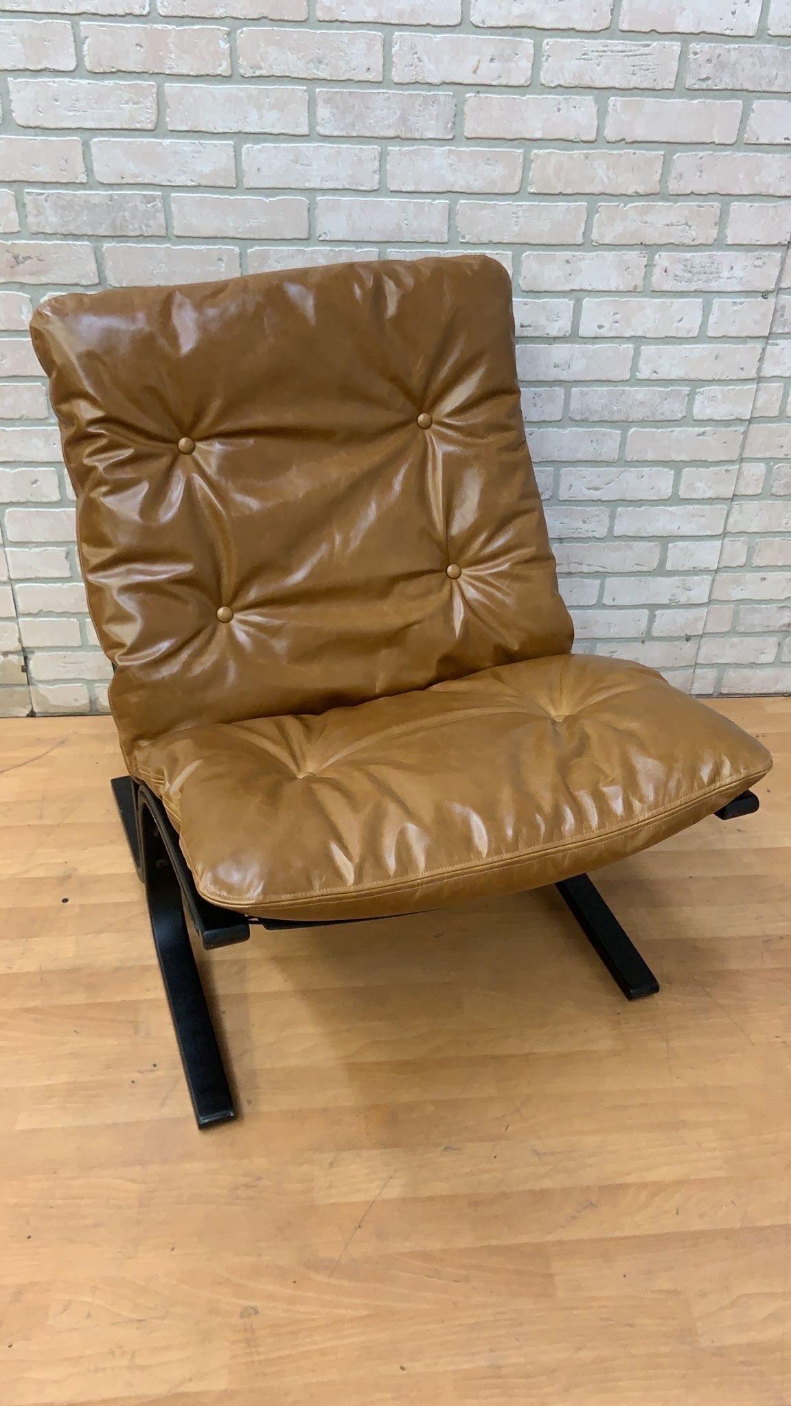 Mid-Century Modern Low Back Siesta Lounge by Westnofa Newly Upholstered in Distressed Cognac Italian Leather

Ingmar Relling for Westnofa low back Siesta chair. This authentic Mid-Century Modern sling chair features Newly Upholstered Full Grain