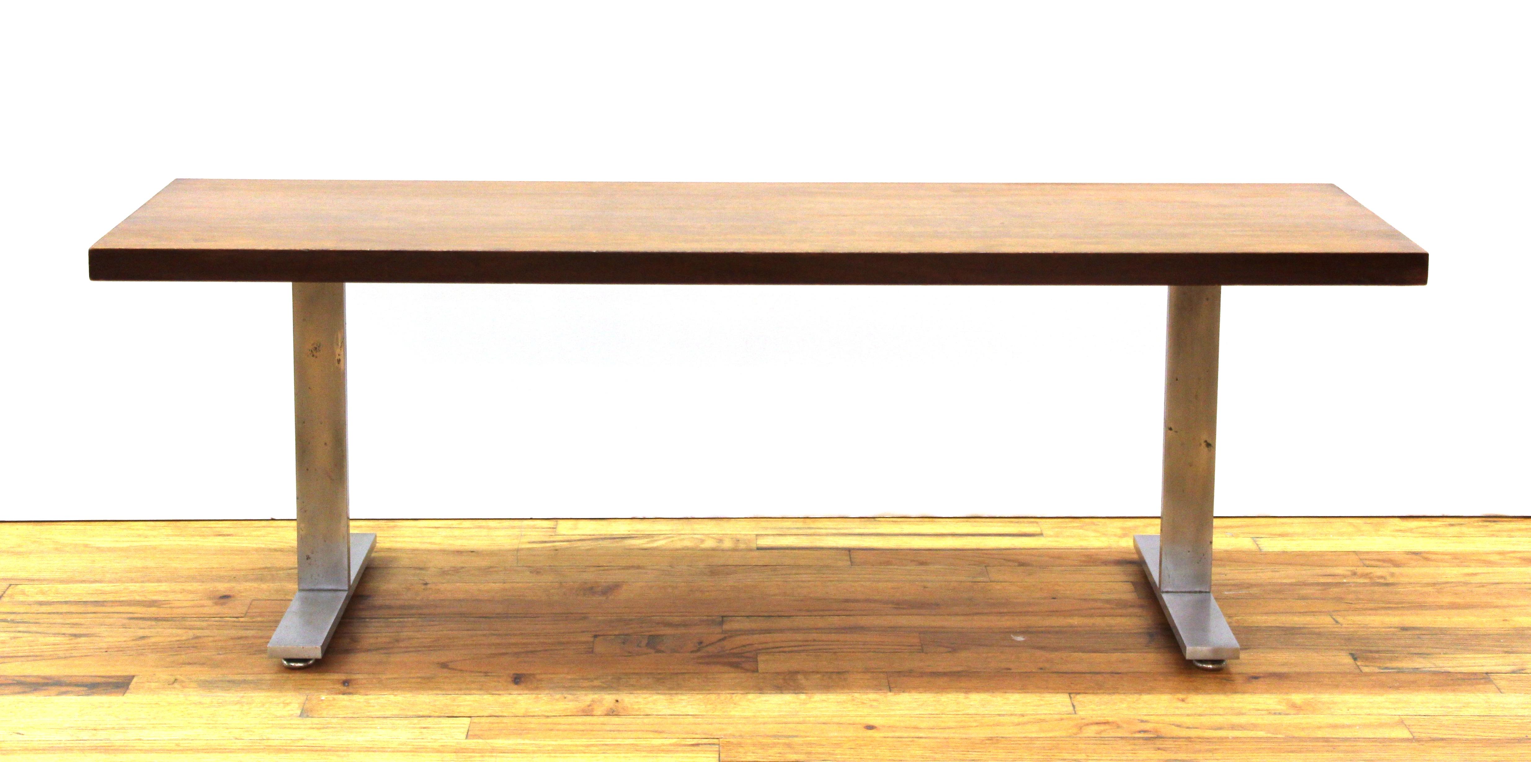 Mid-Century Modern low bench with hardwood top and metal legs. In great vintage condition with age-appropriate wear and use.