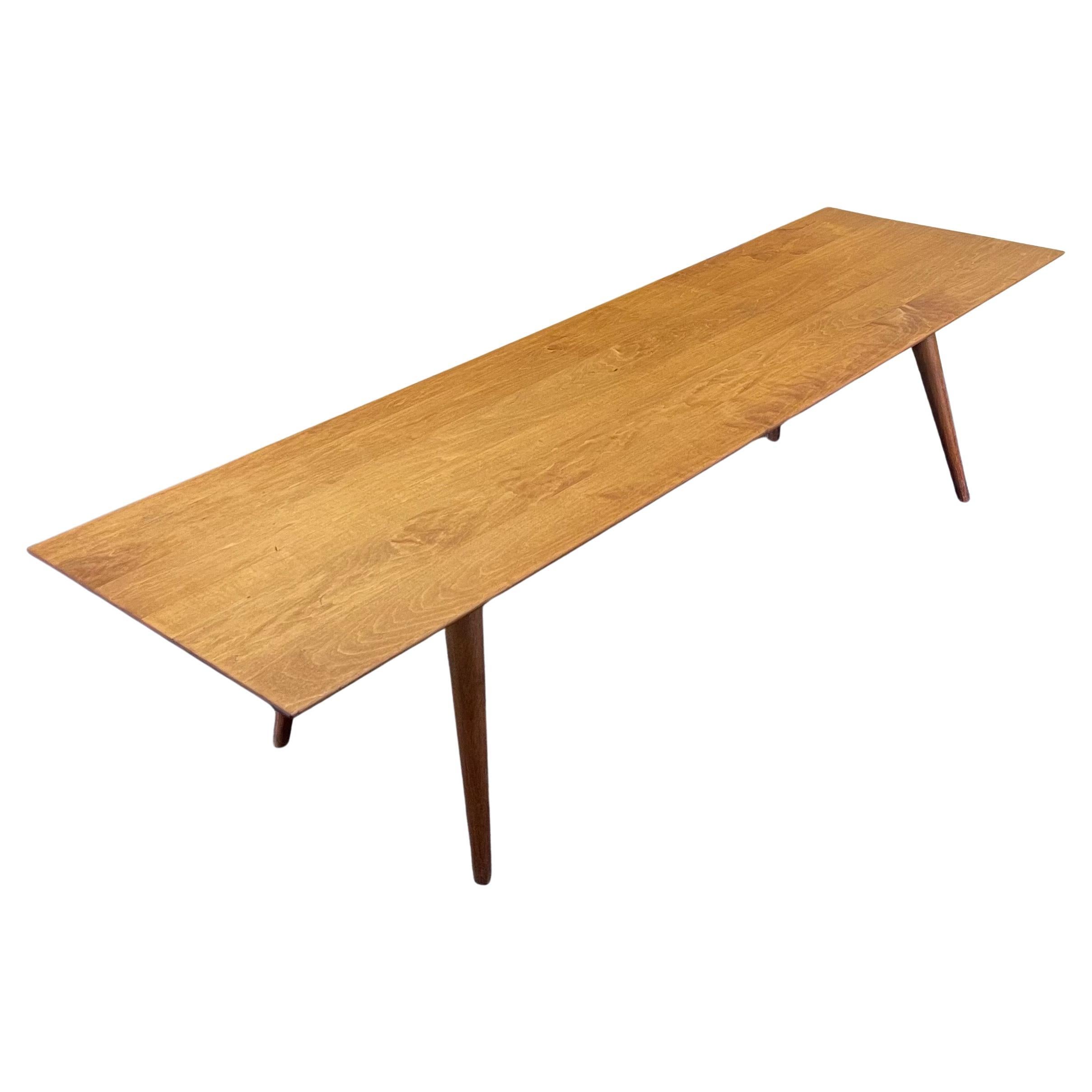 Gorgeous mid-century modern low profile coffee table by Paul Mc Cobb for The Planner Group, original finish in light walnut stain the table its in original condition, some wear due to age overall very clean for its age retains label, will remove