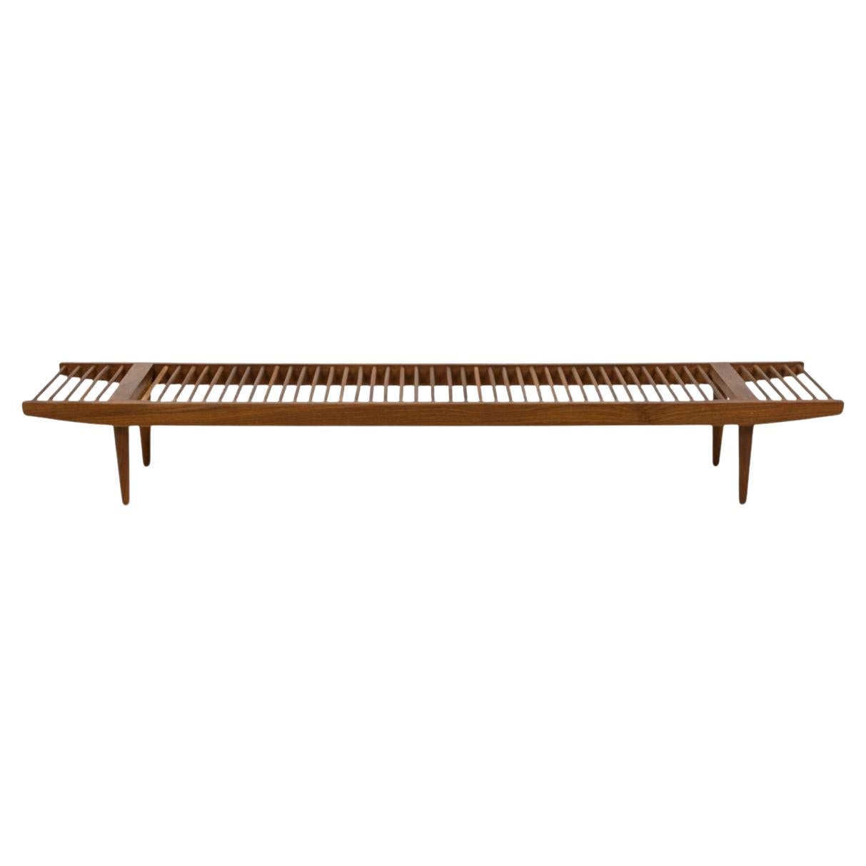 Mid century modern low walnut spindle bench by Milo Baughman
