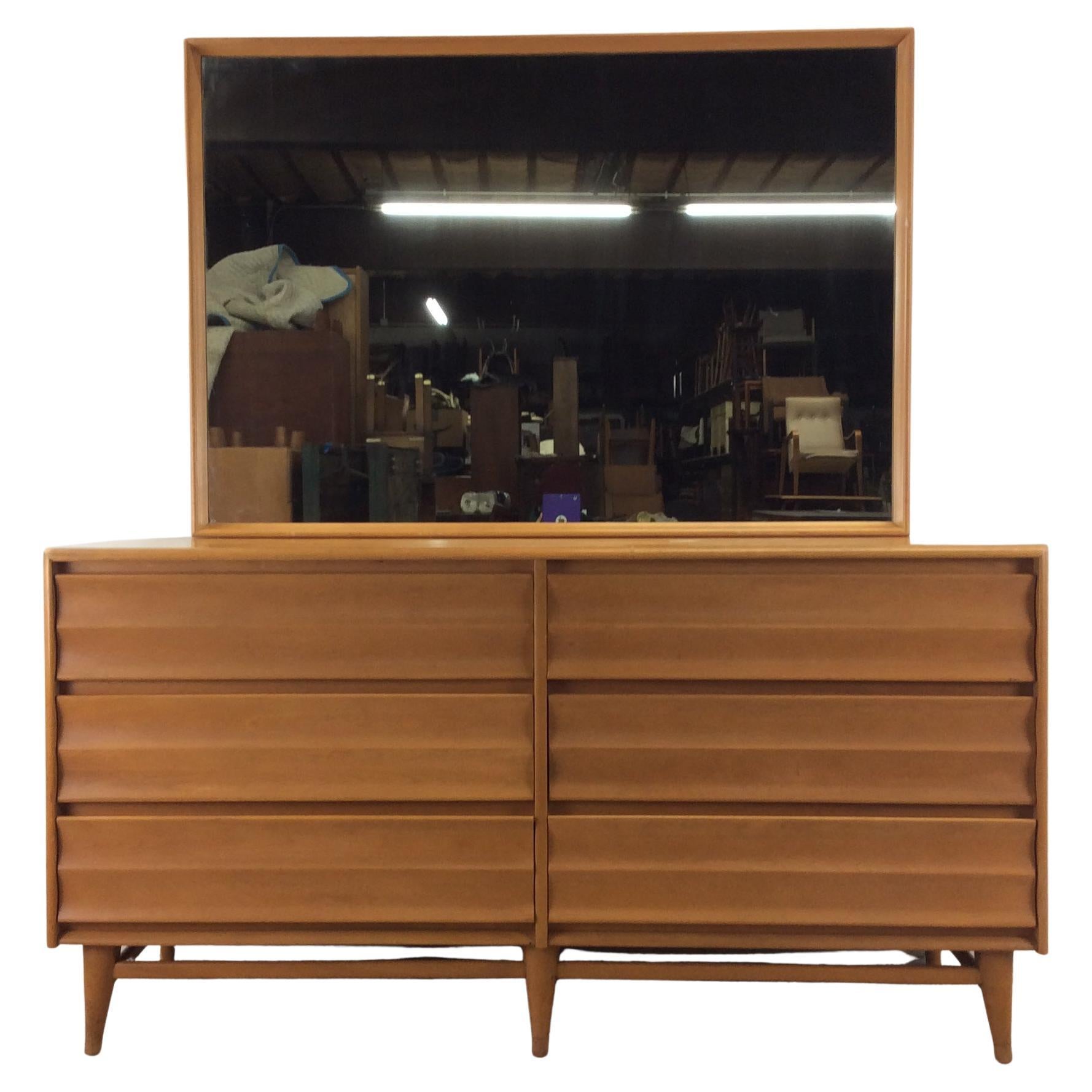 What is a dresser with a mirror on top called?