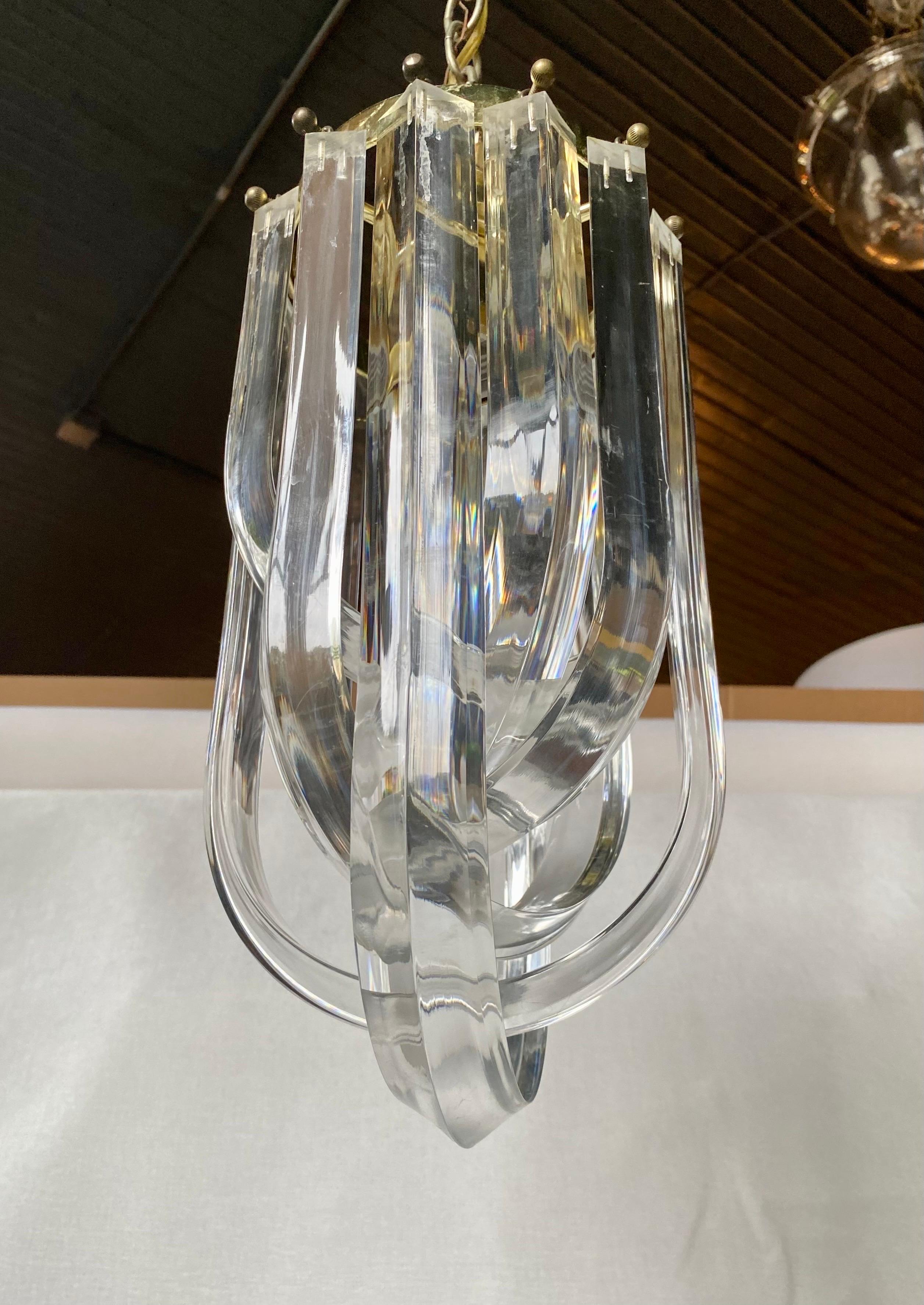 Plated Mid Century Modern Lucite and Brass Ribbon Loop Chandelier