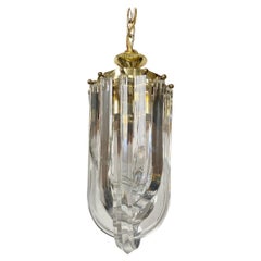 Mid Century Modern Lucite and Brass Ribbon Loop Chandelier