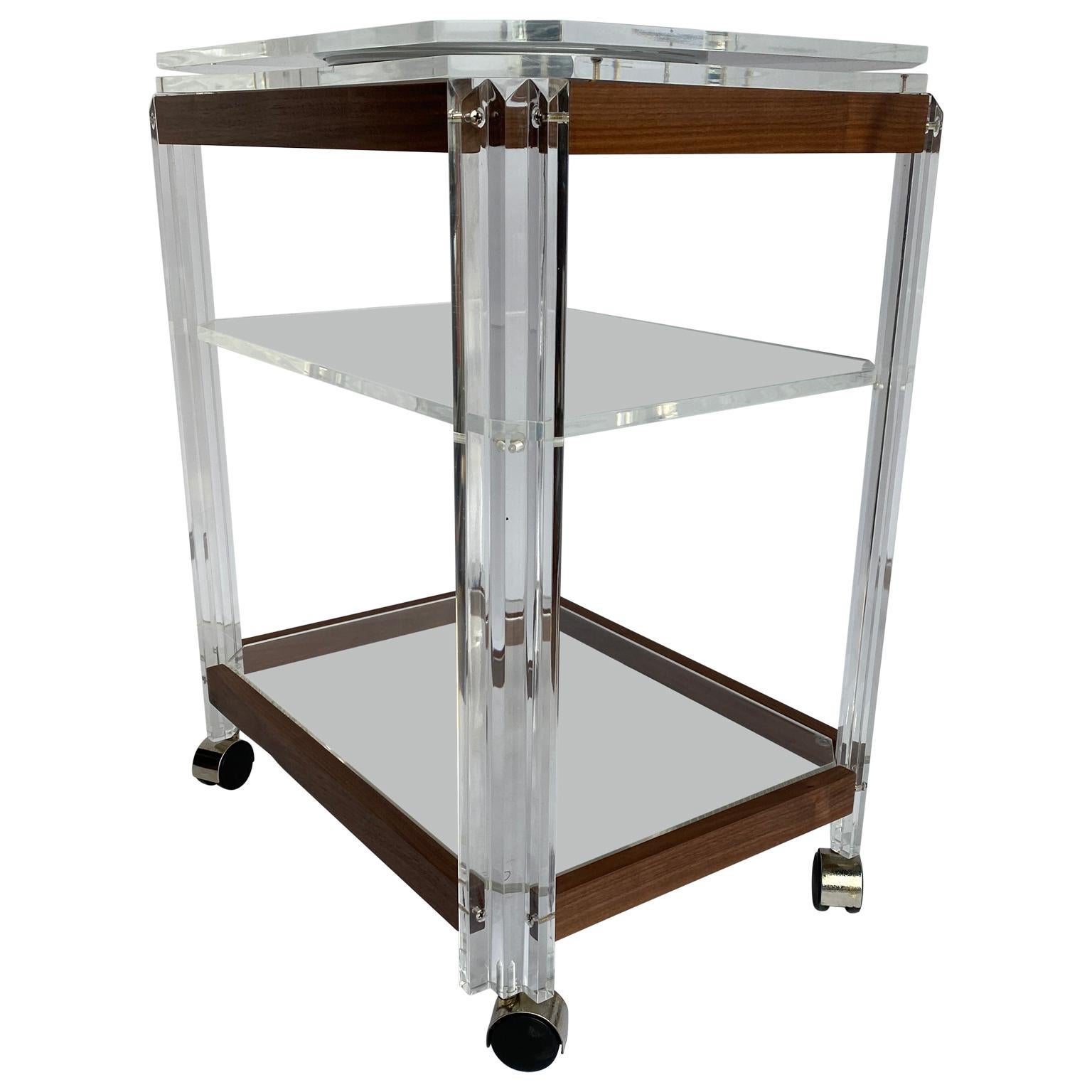 Mid-century three tier lucite and black cherry wood bar cart trolley.