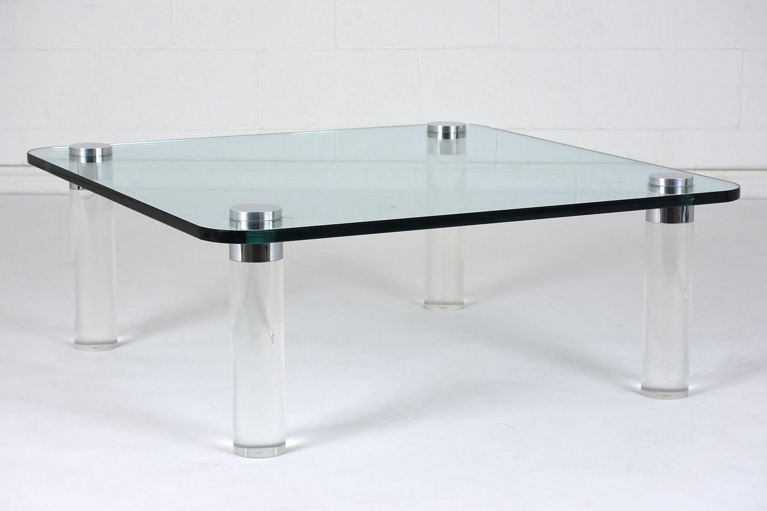 Revel in the timeless allure of our 1960s Mid-Century Modern cocktail table, a pristine reflection of the era's distinguished design. Masterfully handcrafted, this vintage gem combines lucite and clear glass, embodying the best of 60s aesthetics.